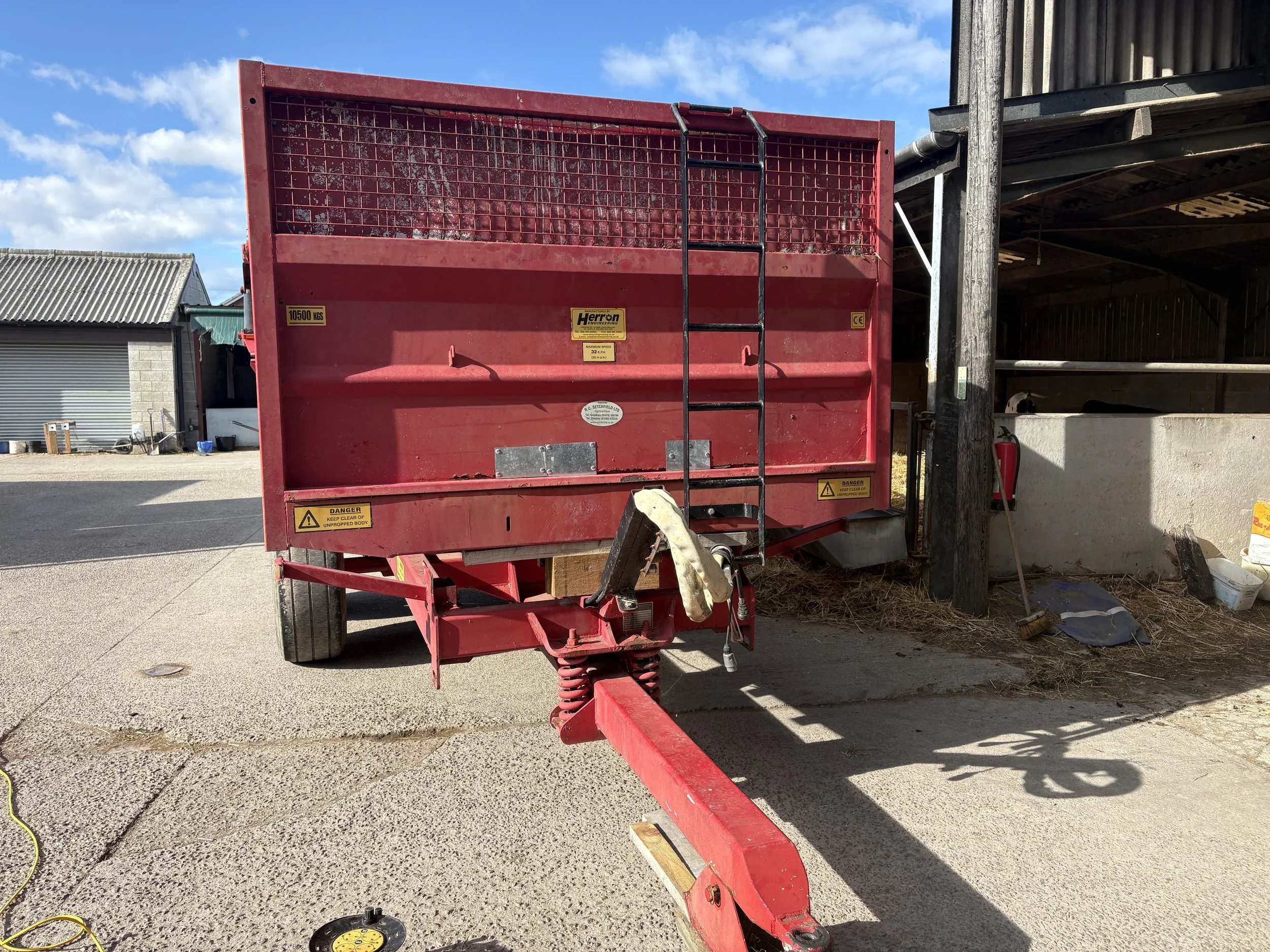 Rusted grain trailer (before).