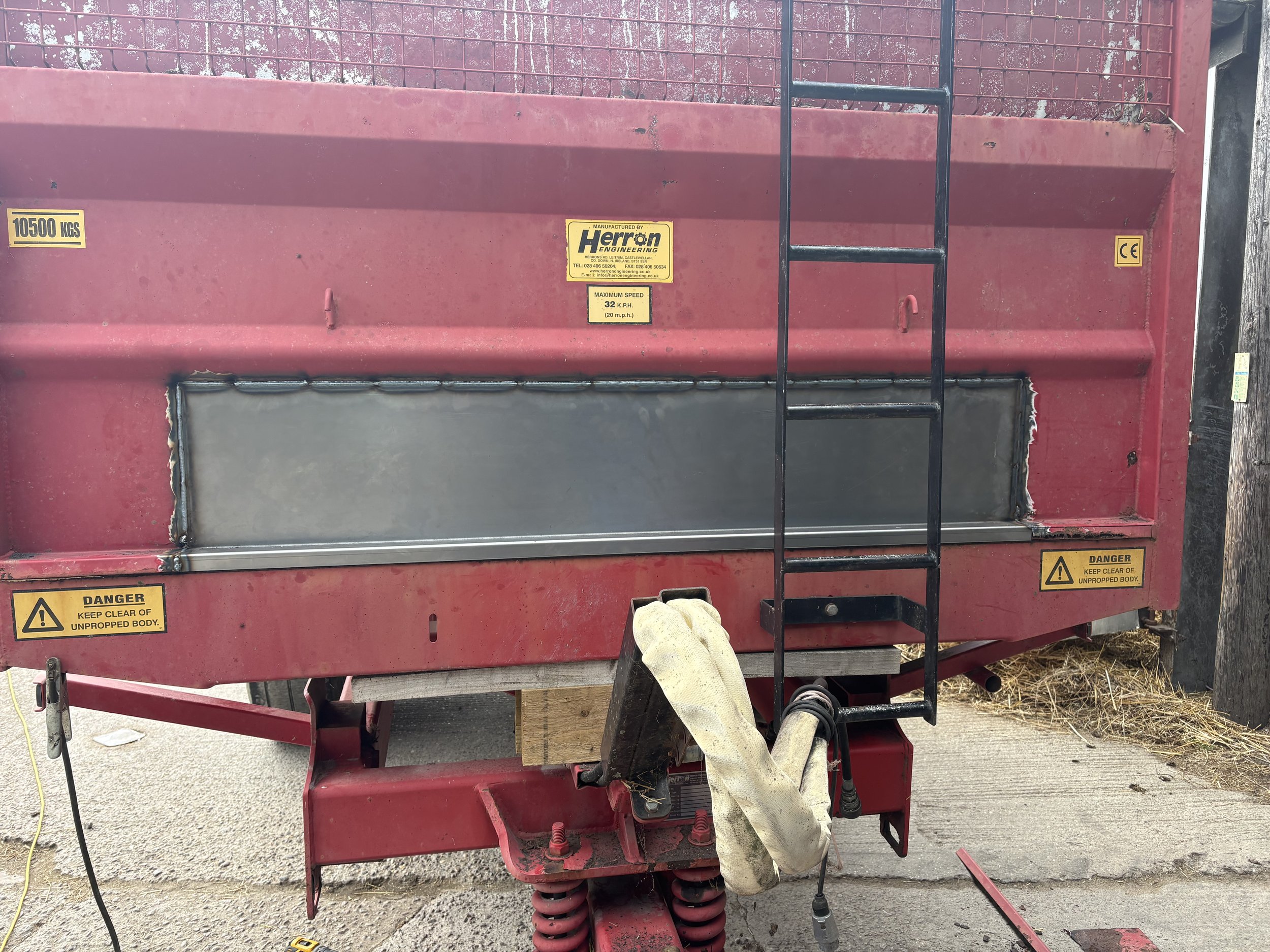 Patch welded in on grain trailer.