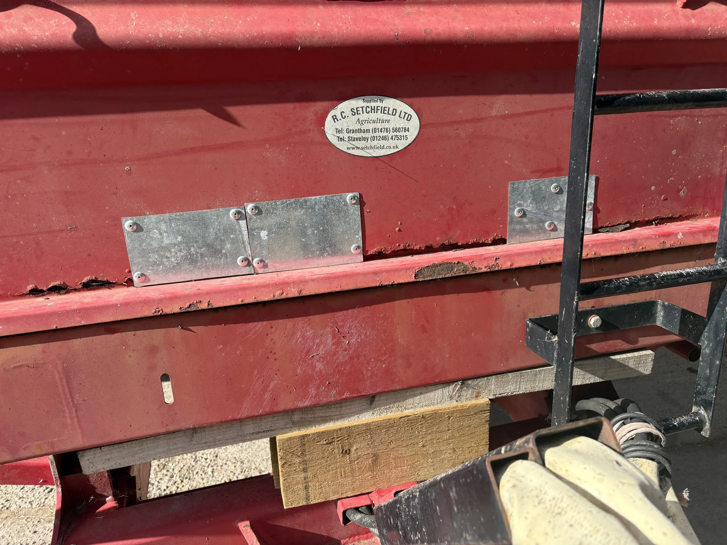 Rusted grain trailer (before).