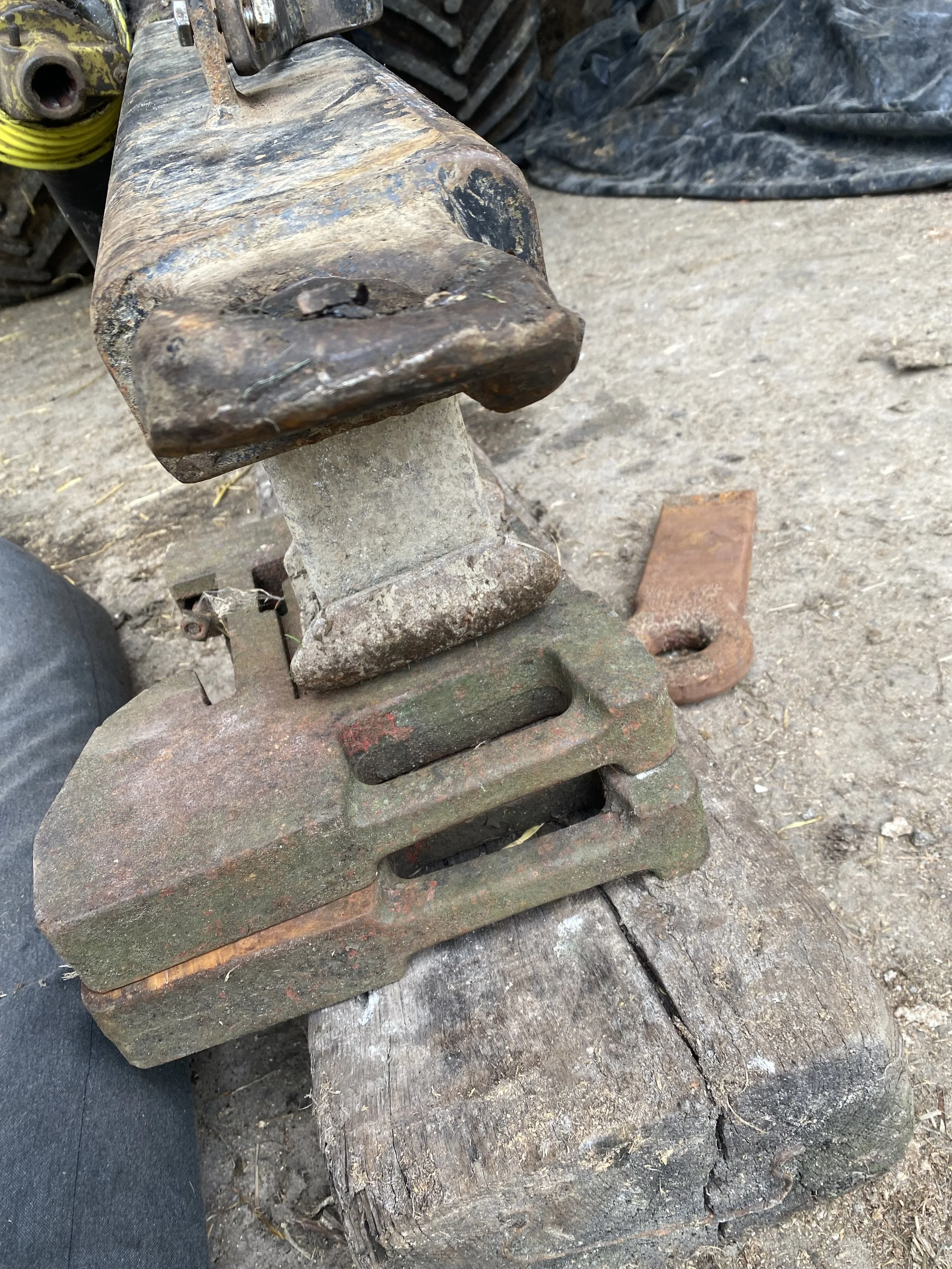 Bent and warn tow eye on a slurry tanker (before).