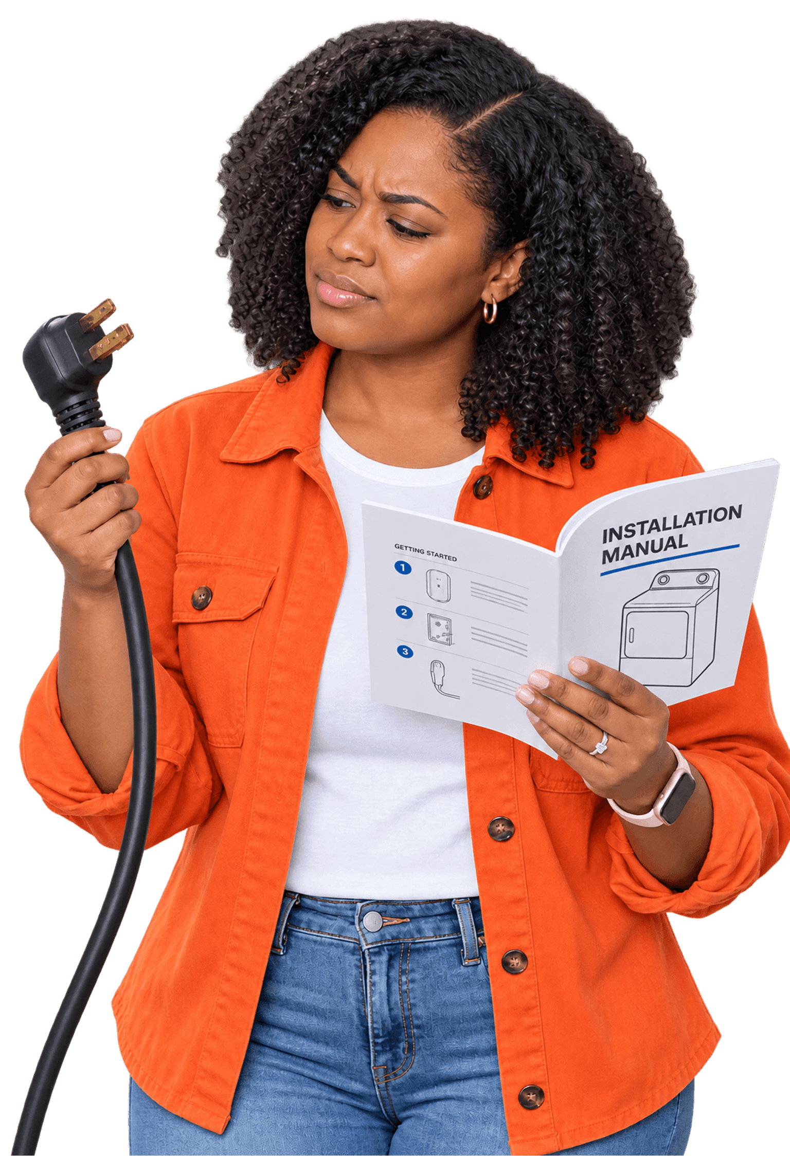 A woman in an orange jacket holding an electrical plug in one hand and a manual in the other, looking confused and puzzled.