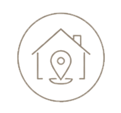 Icon of a house with a location pin inside, surrounded by a circle
