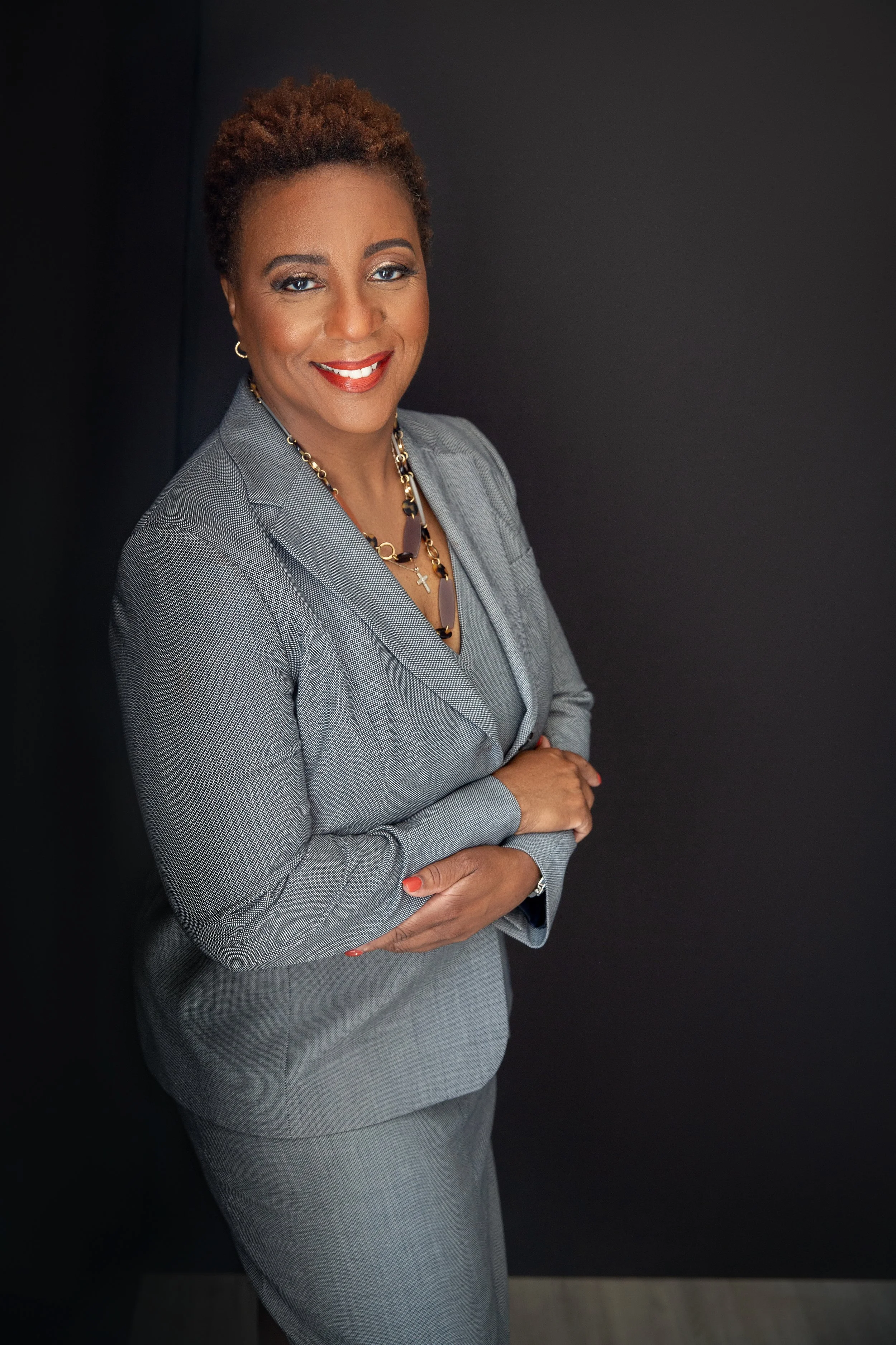 black woman grey suit.jpg