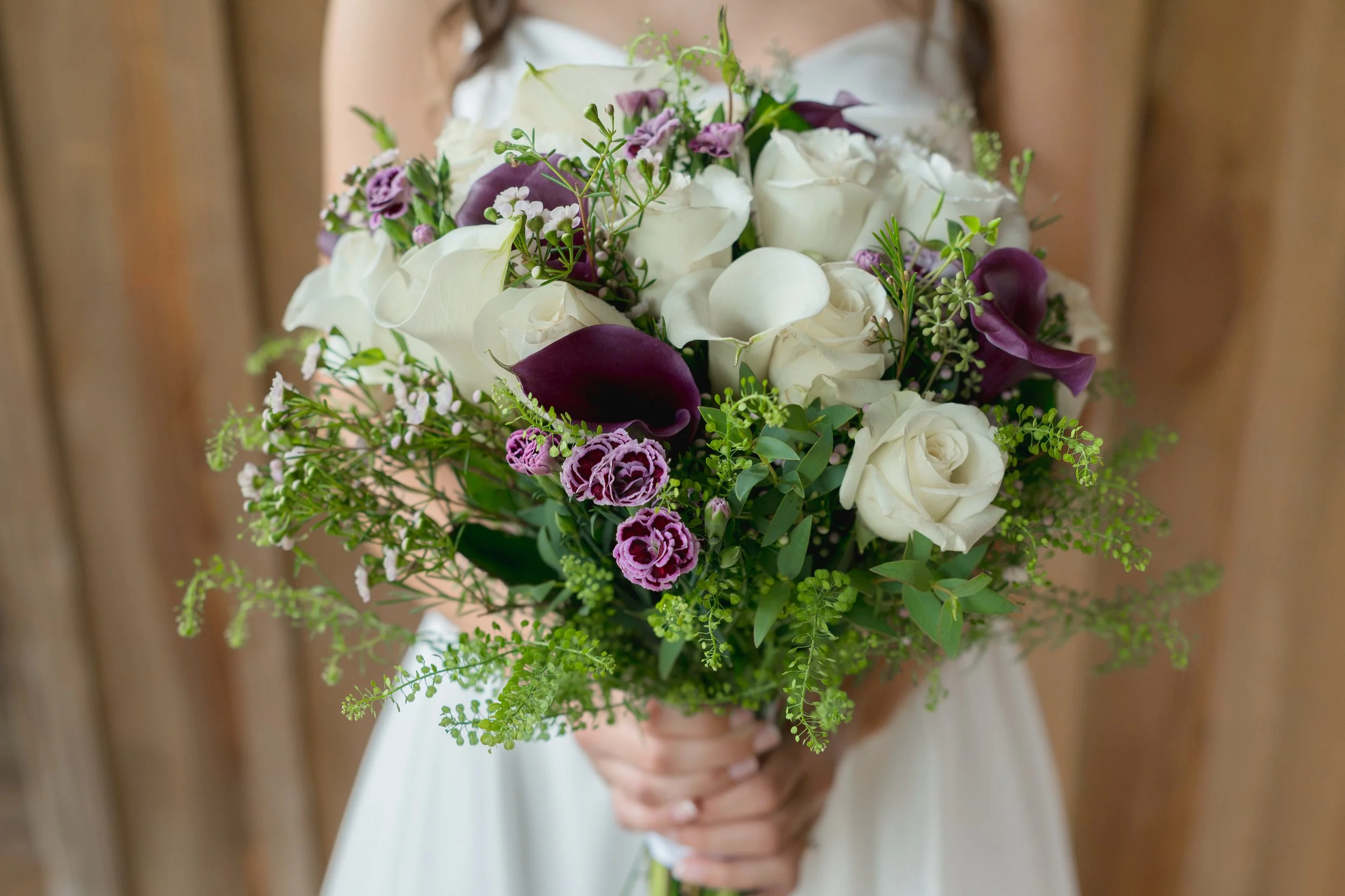 Lilac bouquet captured at Lewiswood Farm in Tallahassee, Florida by Florida Documentary Wedding Photographer Catherine Skelly