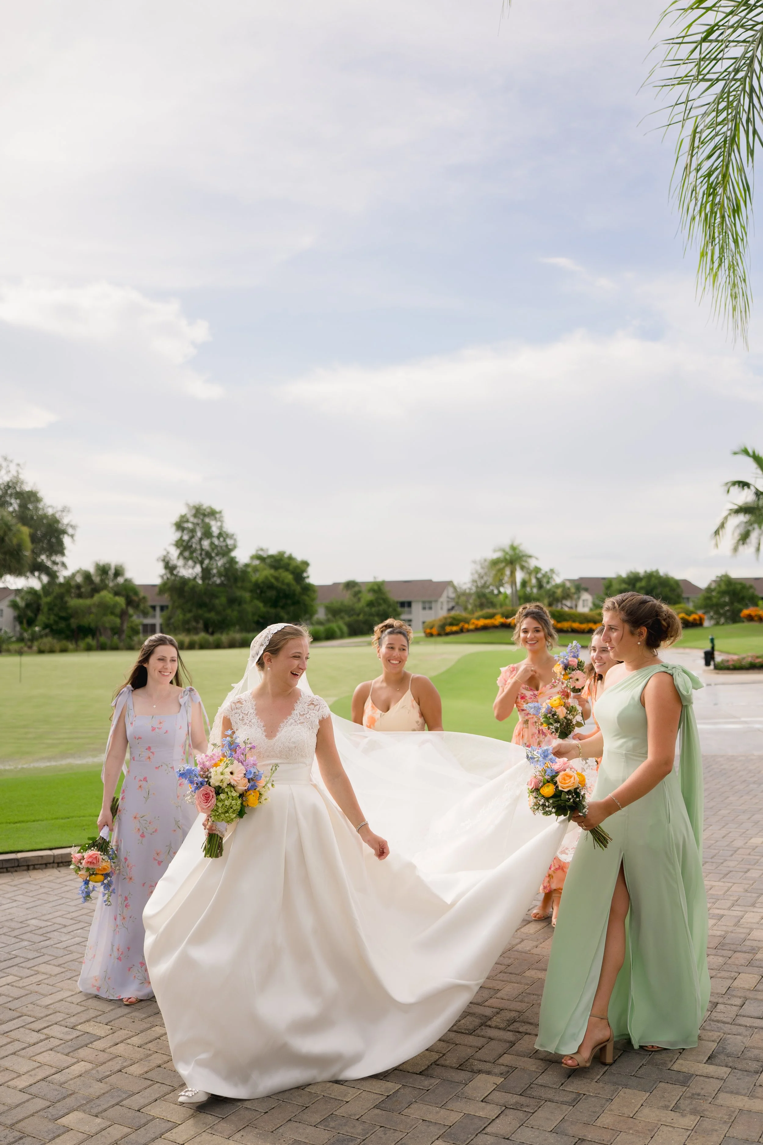 Colorful and Candid Bridesmaid Portraits captured at The Club at The Strand in Naples, Florida by Florida Documentary Wedding Photographer Catherine Skelly