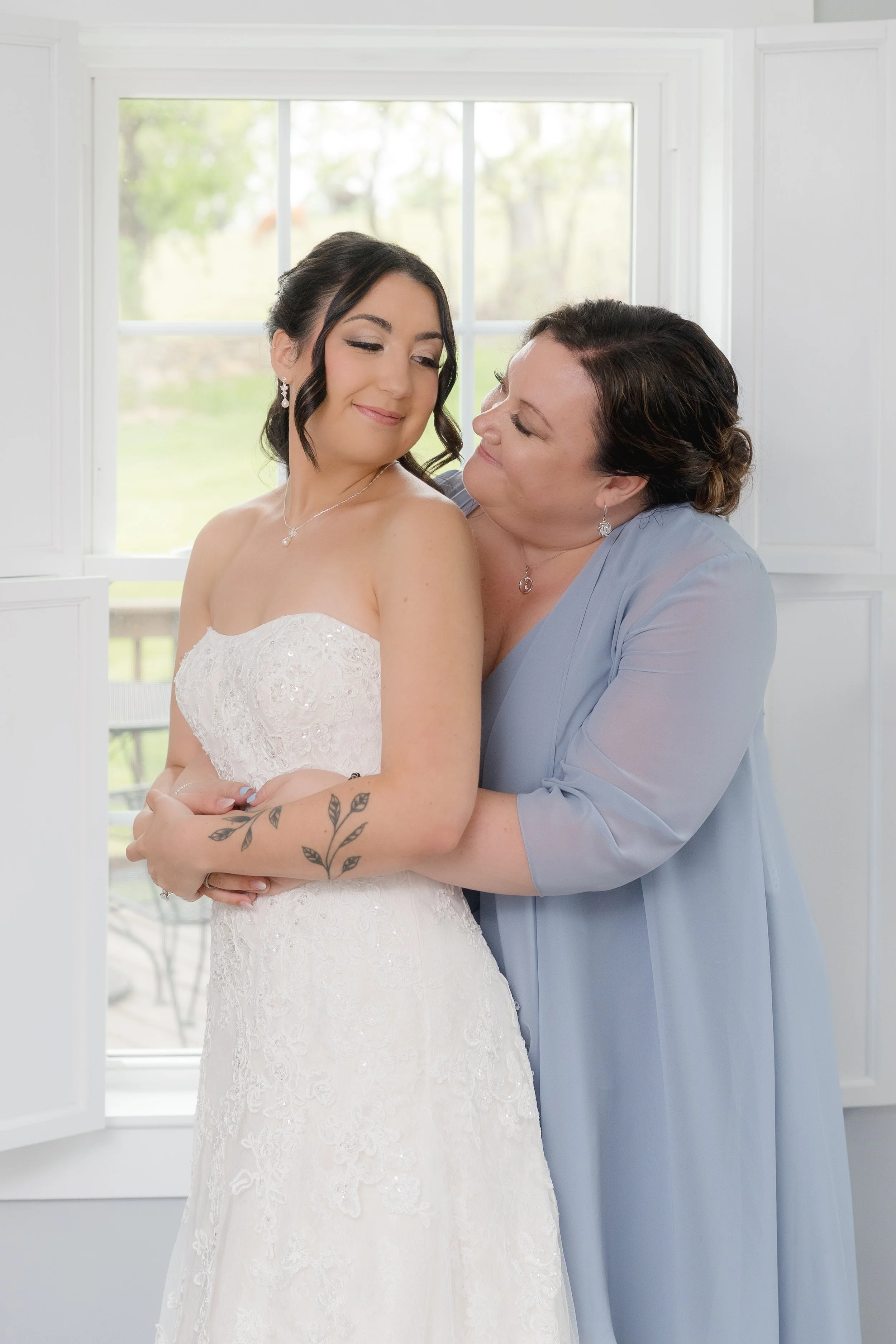 Mother of the Bride and Bride getting ready photos for a Catholic Wedding in Purcellville, Virginia captured by Florida Documentary Photographer Catherine Skelly