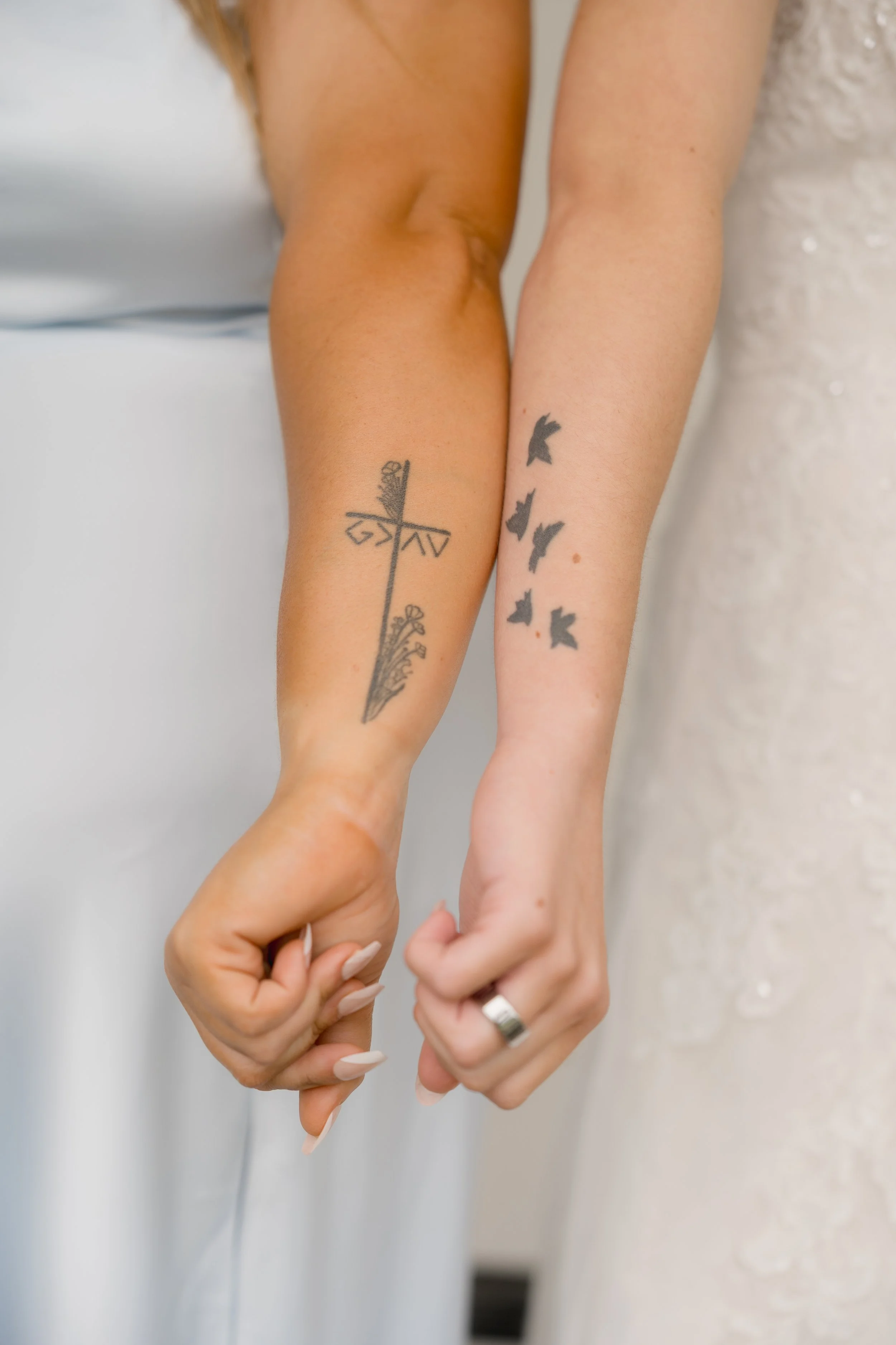 Matching bridesmaids tattoos for a Catholic Wedding in Purcellville, Virginia captured by Florida Documentary Photographer Catherine Skelly