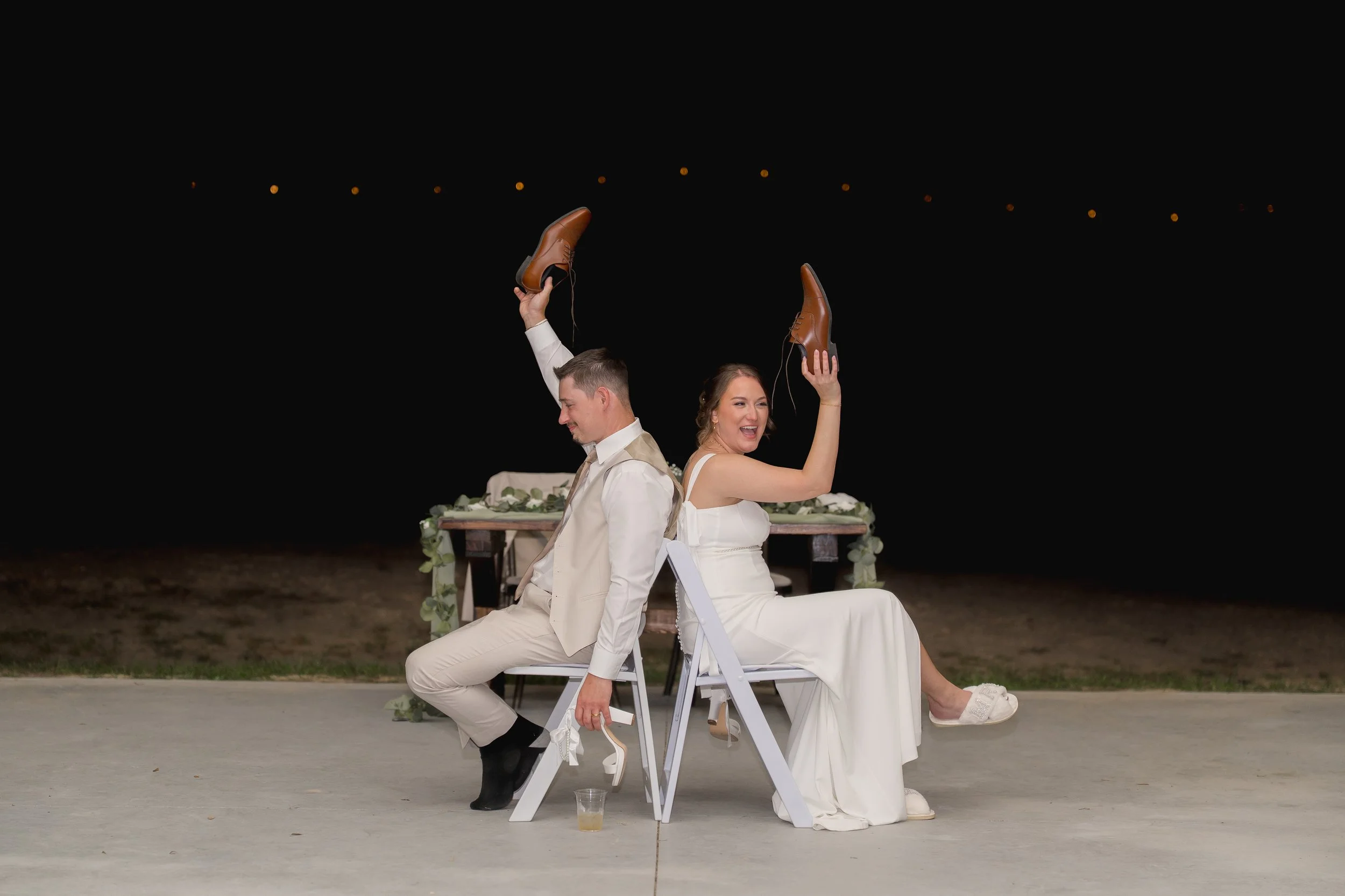 Shoe game captured during an Outdoor Wedding at Stonewood Events in Alachua, Florida captured by Florida Documentary Wedding Photographer Catherine Skelly