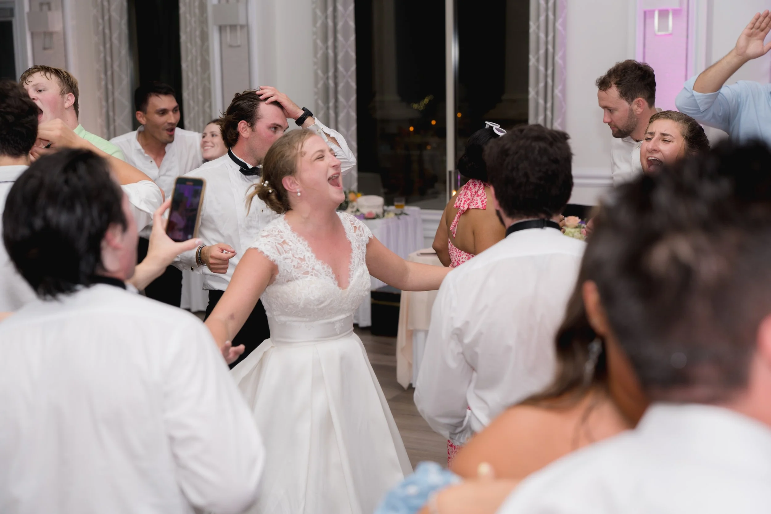 Wedding reception captured at The Club at The Strand in Naples, Florida by Florida Documentary Wedding Photographer Catherine Skelly