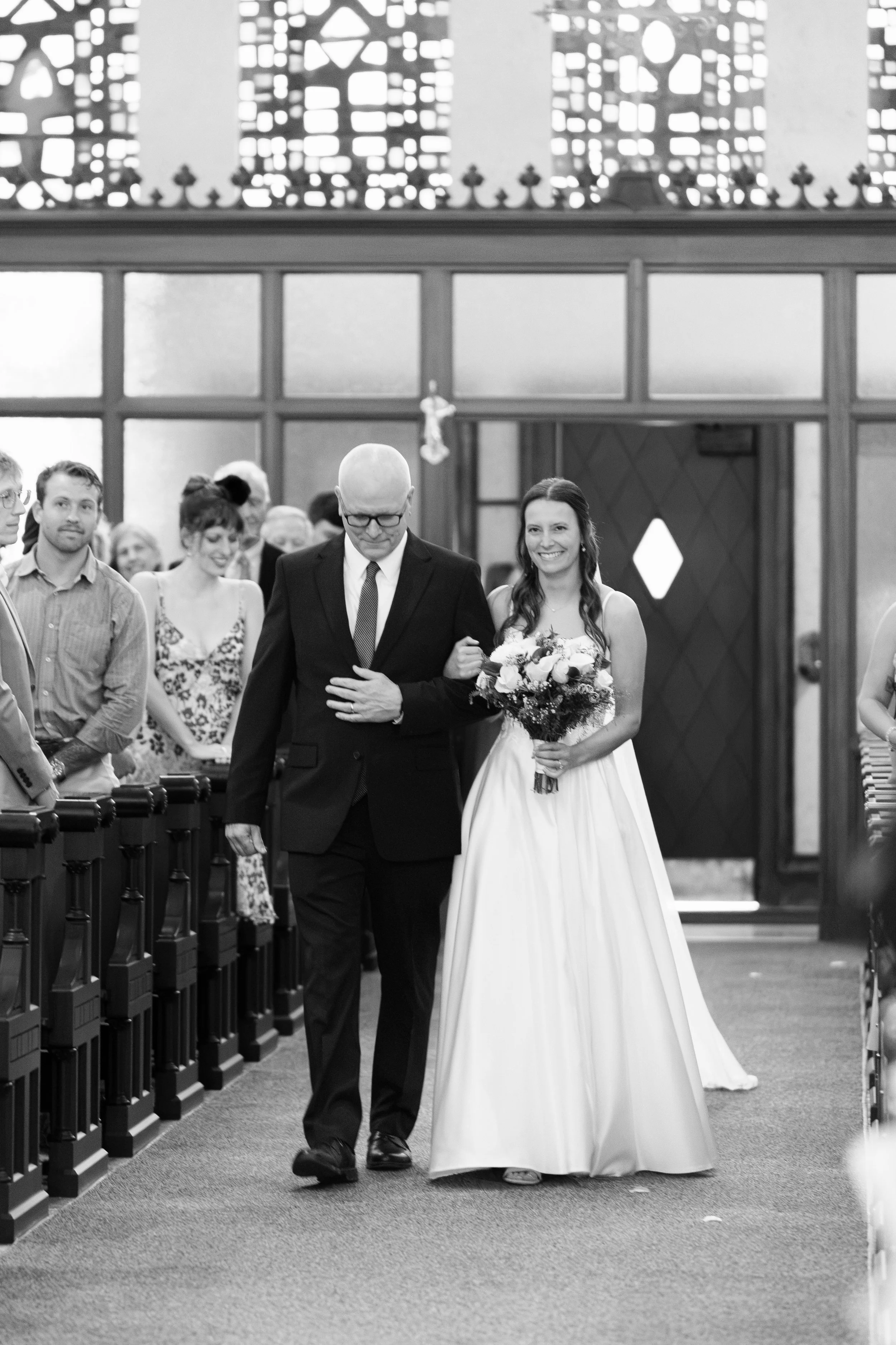 Catholic Wedding Ceremony at Co-Cathedral St. Thomas Moore in Tallahassee, Florida captured by Florida Documentary Photographer Catherine Skelly