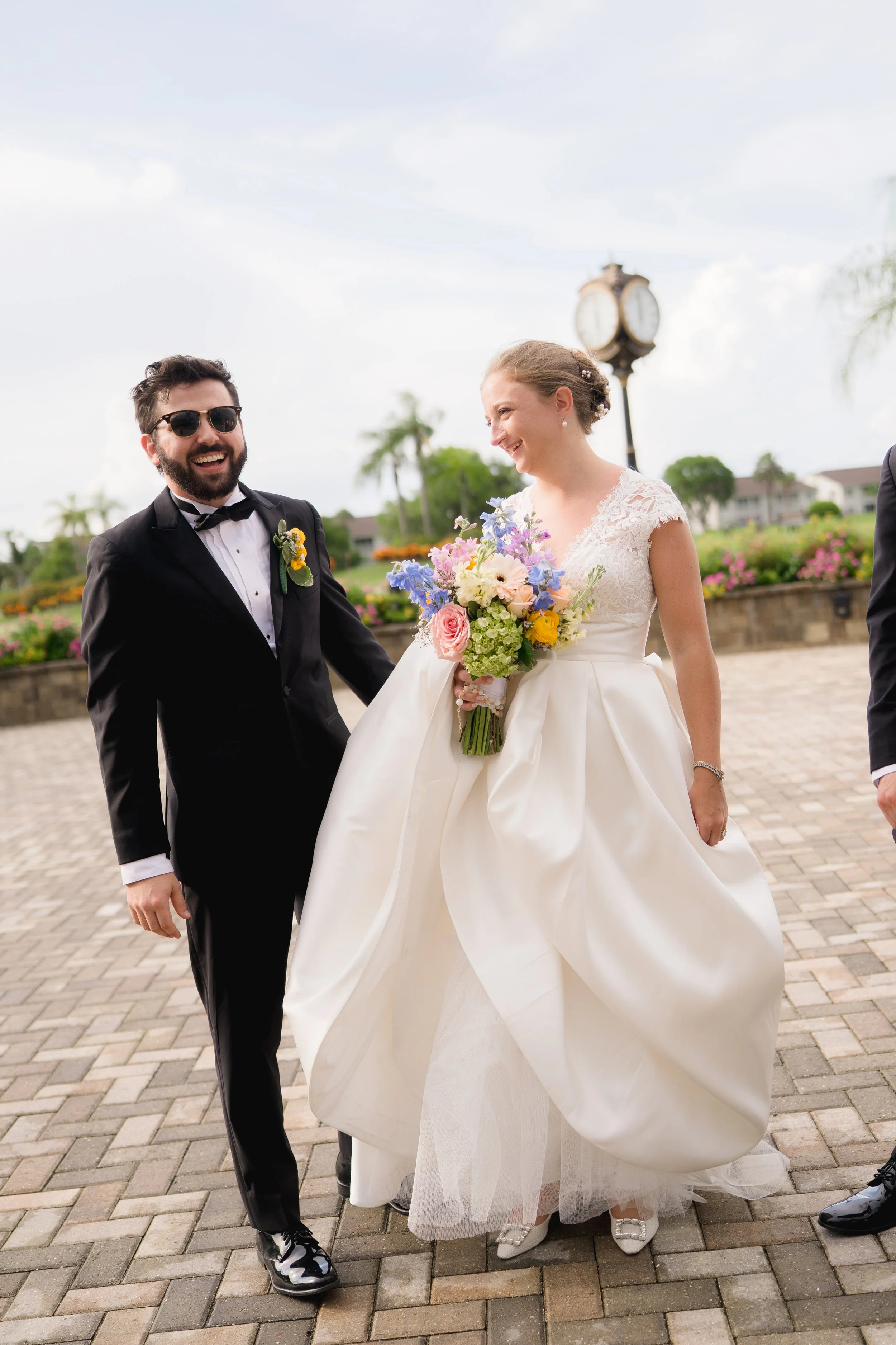 Colorful and Candid Newlywed Portraits captured at The Club at The Strand in Naples, Florida by Florida Documentary Wedding Photographer Catherine Skelly