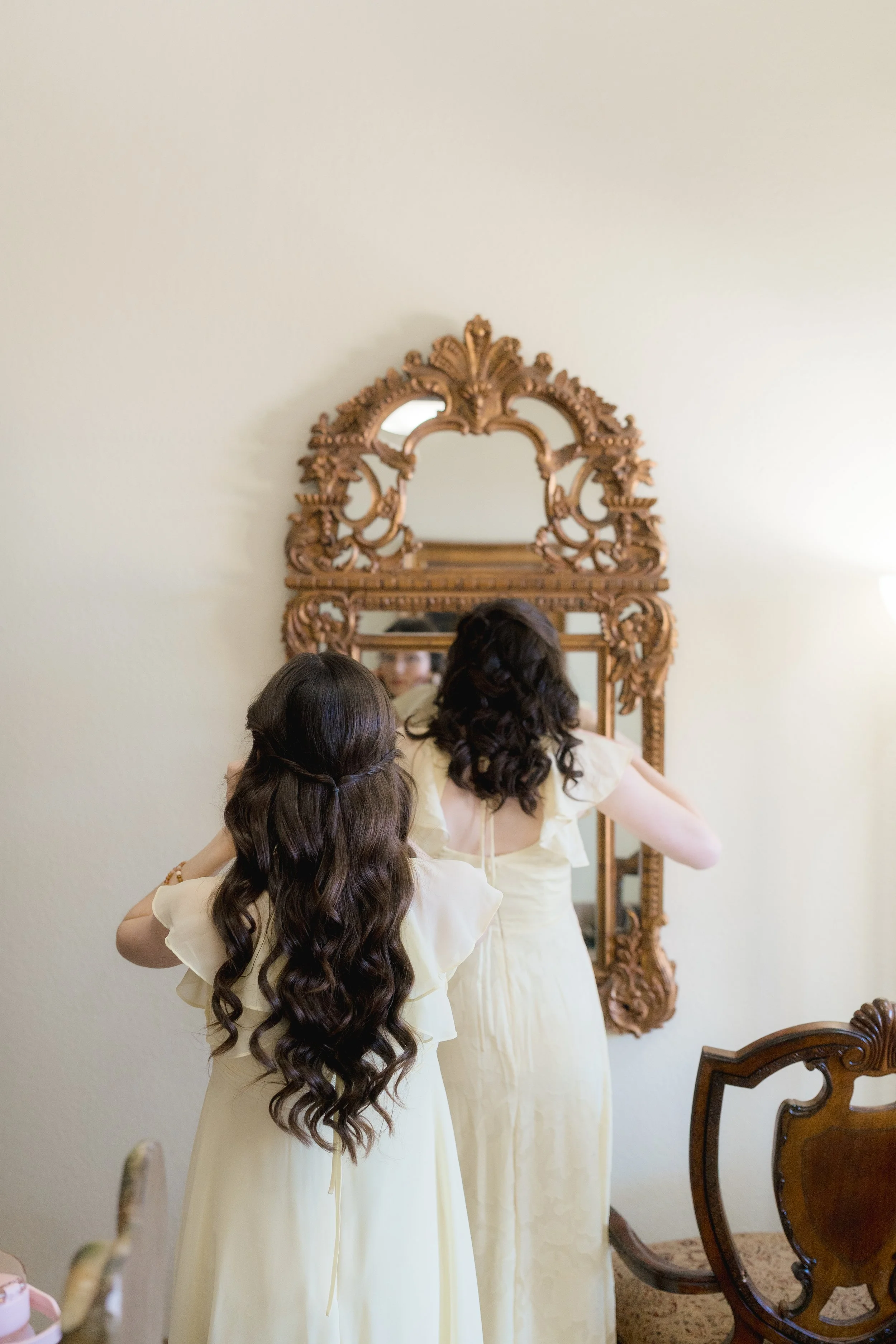 Candid Getting Ready Photos for a Catholic Wedding captured at The Best Western Grand in Gainesville, Florida by Florida Documentary Photographer Catherine Skelly