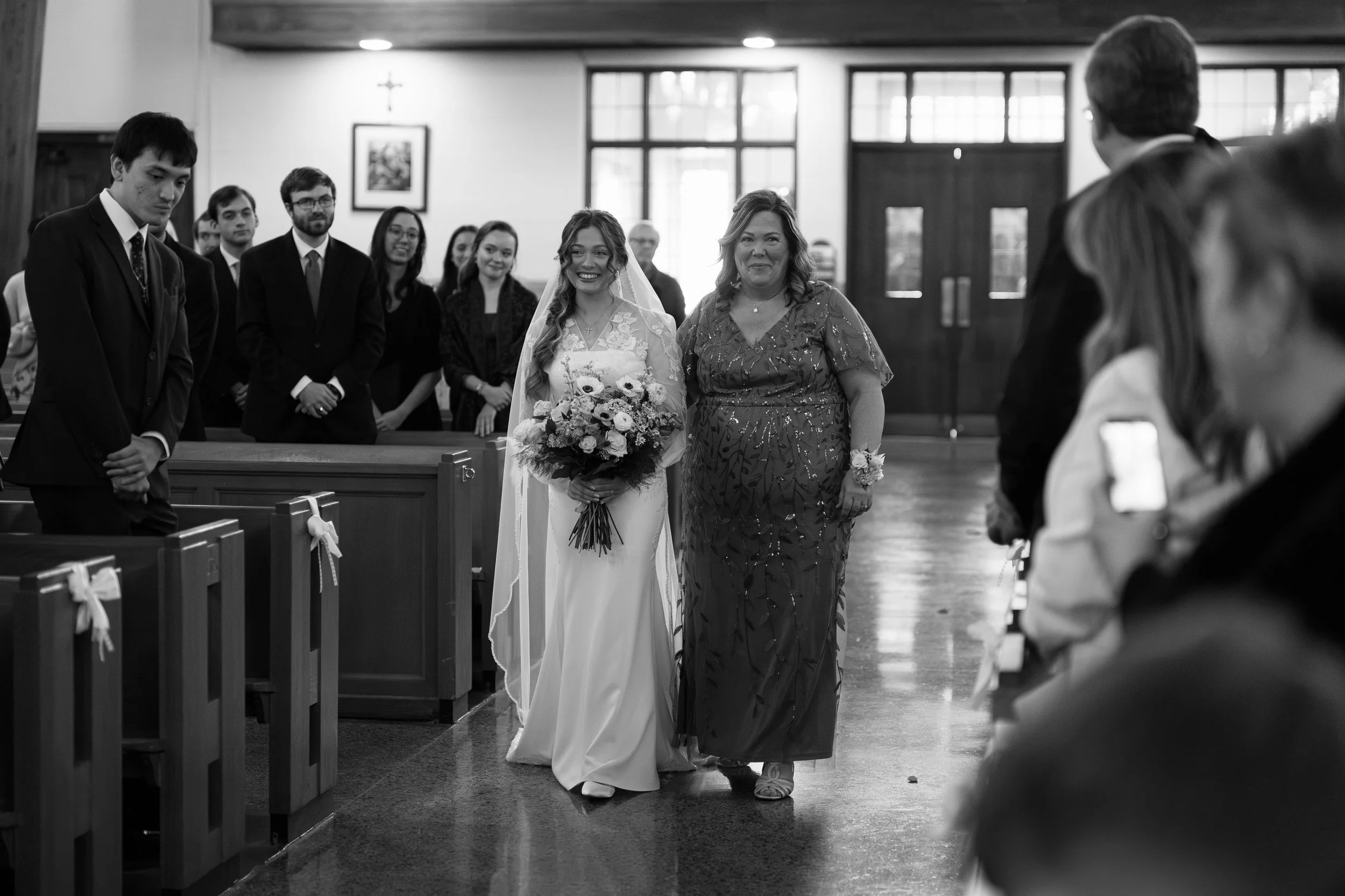 Catholic Wedding captured at St. Augustine Catholic Church by University of Florida in Gainesville, Florida by Florida Documentary Photographer Catherine Skelly