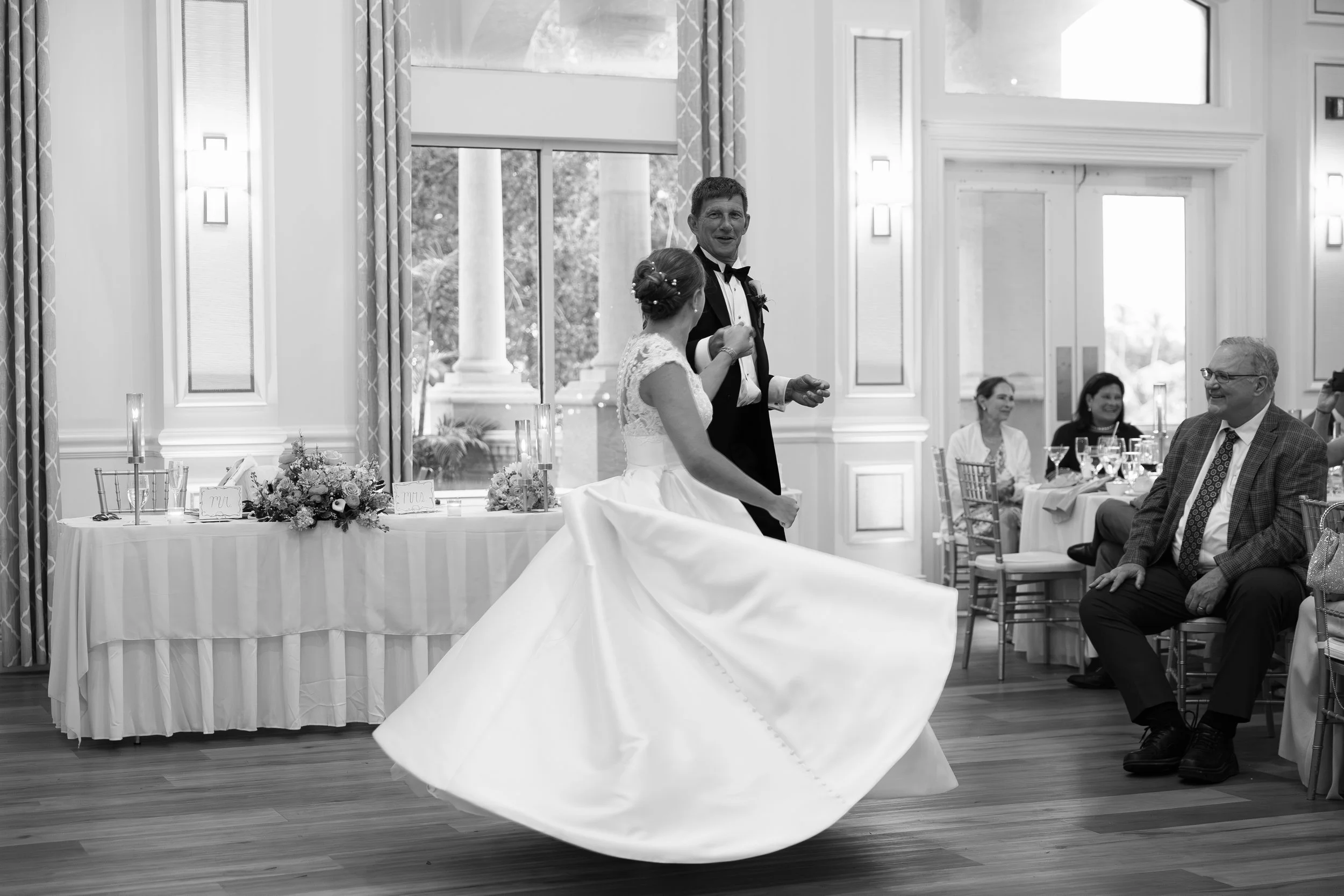 Wedding reception captured at The Club at The Strand in Naples, Florida by Florida Documentary Wedding Photographer Catherine Skelly