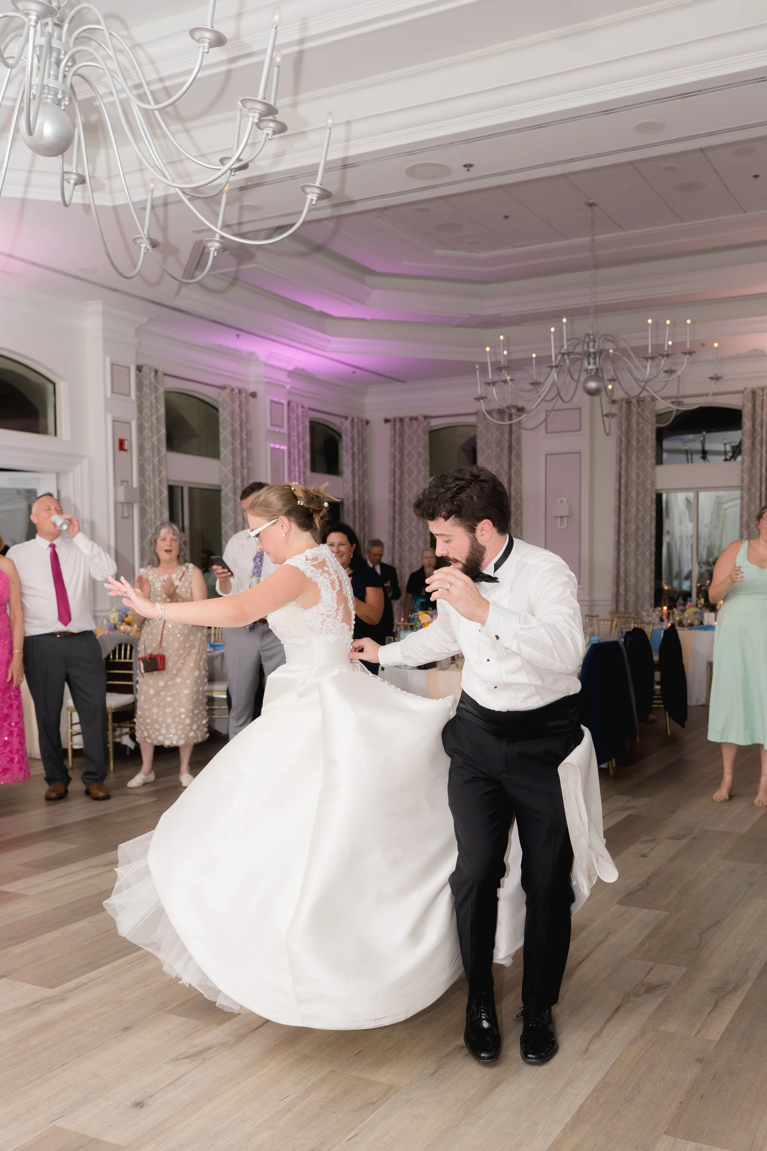 Wedding reception captured at The Club at The Strand in Naples, Florida by Florida Documentary Wedding Photographer Catherine Skelly