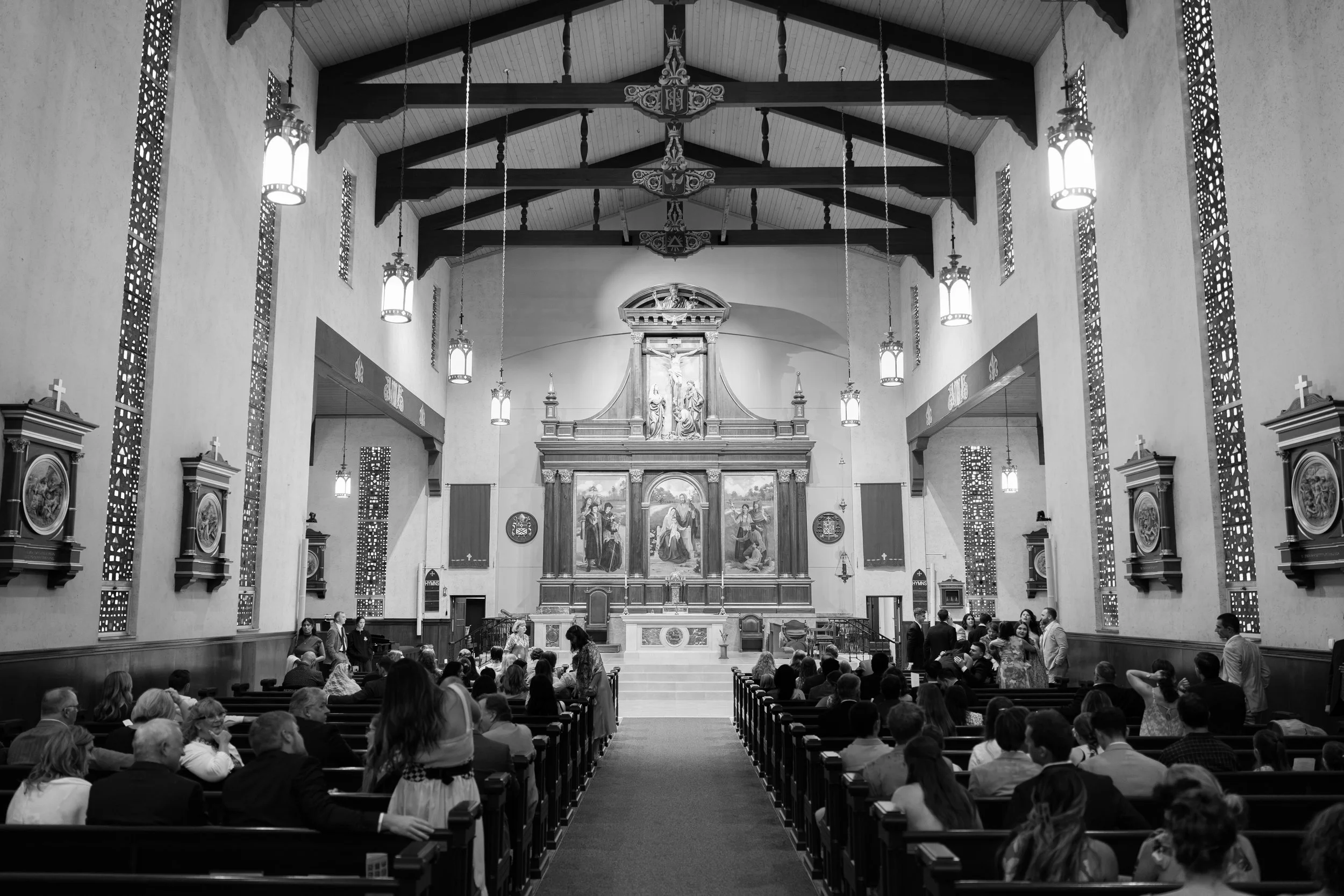 Catholic Wedding Ceremony at Co-Cathedral St. Thomas Moore in Tallahassee, Florida captured by Florida Documentary Photographer Catherine Skelly