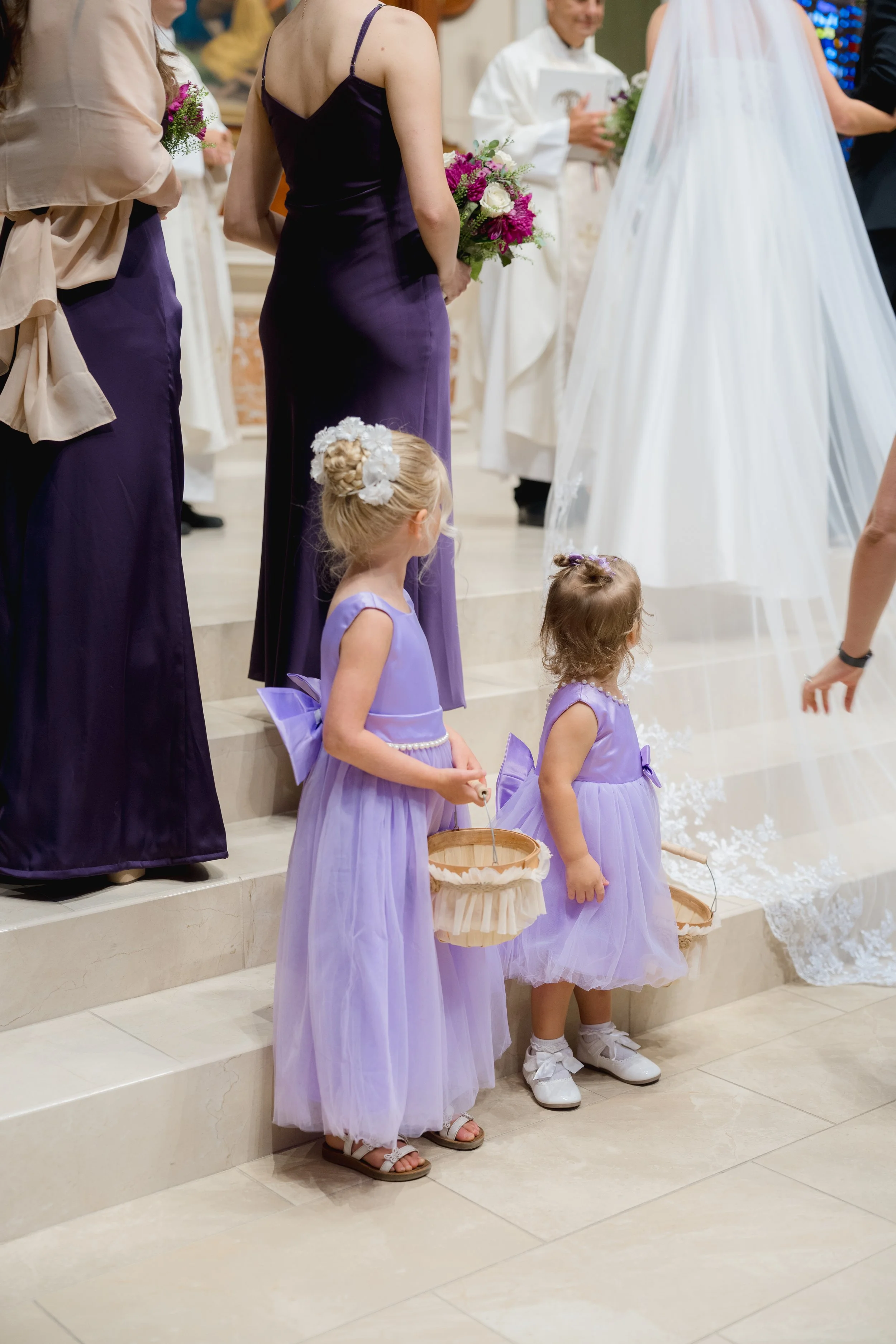 Lilac Catholic Wedding Ceremony at Co-Cathedral St. Thomas Moore in Tallahassee, Florida captured by Florida Documentary Photographer Catherine Skelly