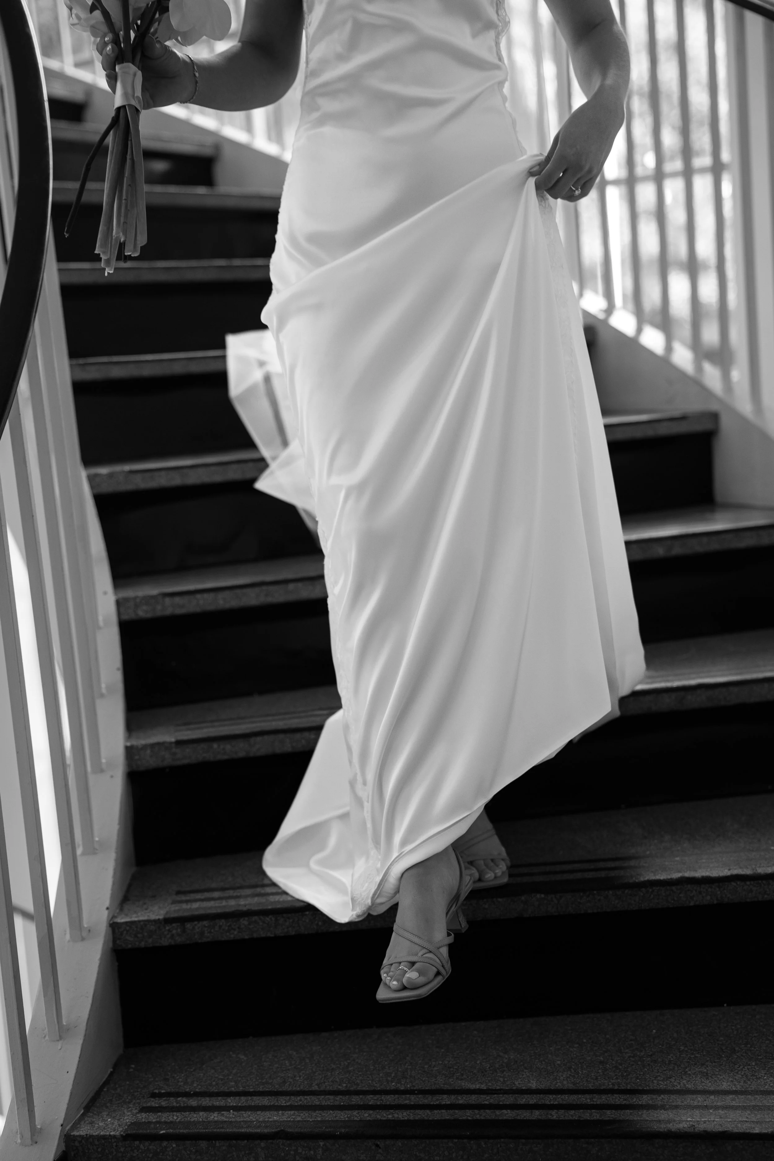 Bridal Portraits on the stairs at First Presbyterian Church in Orlando captured by Florida Documentary Photographer Catherine Skelly