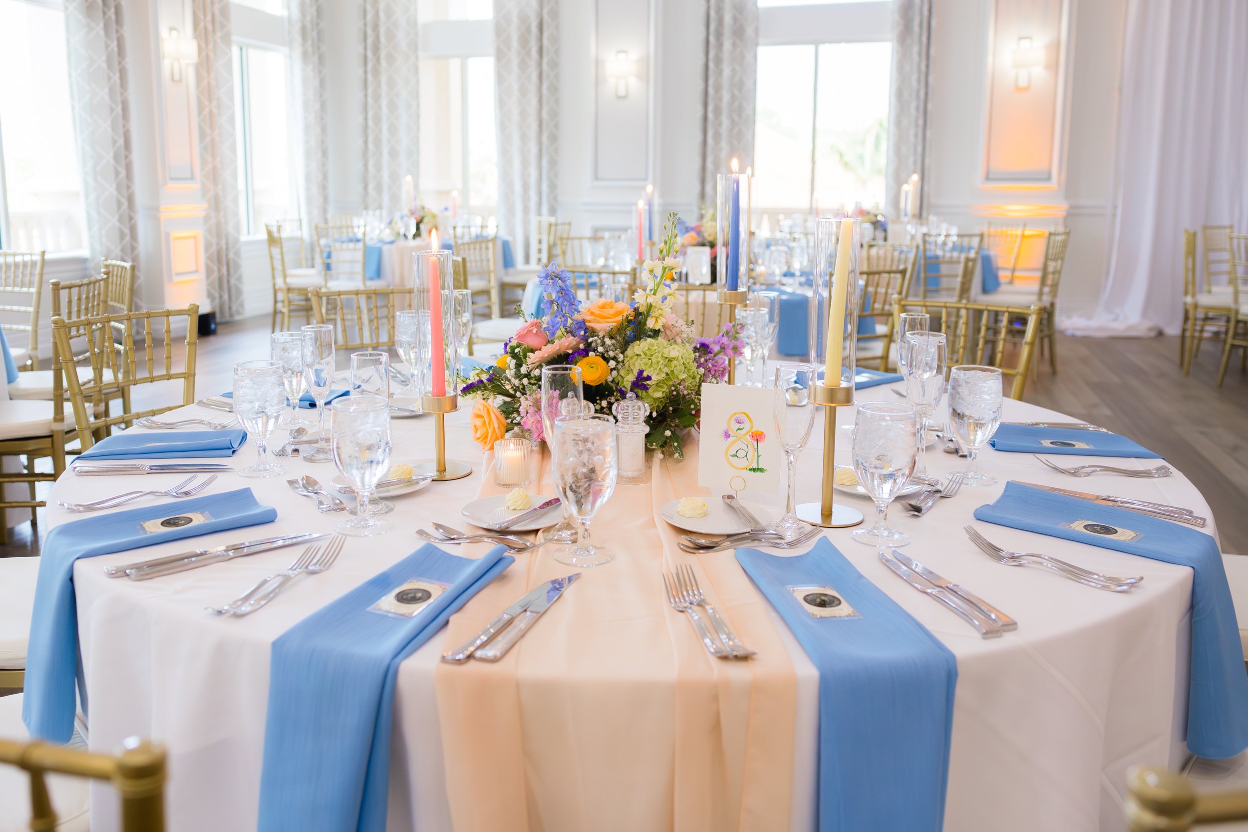 Colorful wedding reception tablescapes captured at The Club at The Strand in Naples, Florida by Florida Documentary Wedding Photographer Catherine Skelly