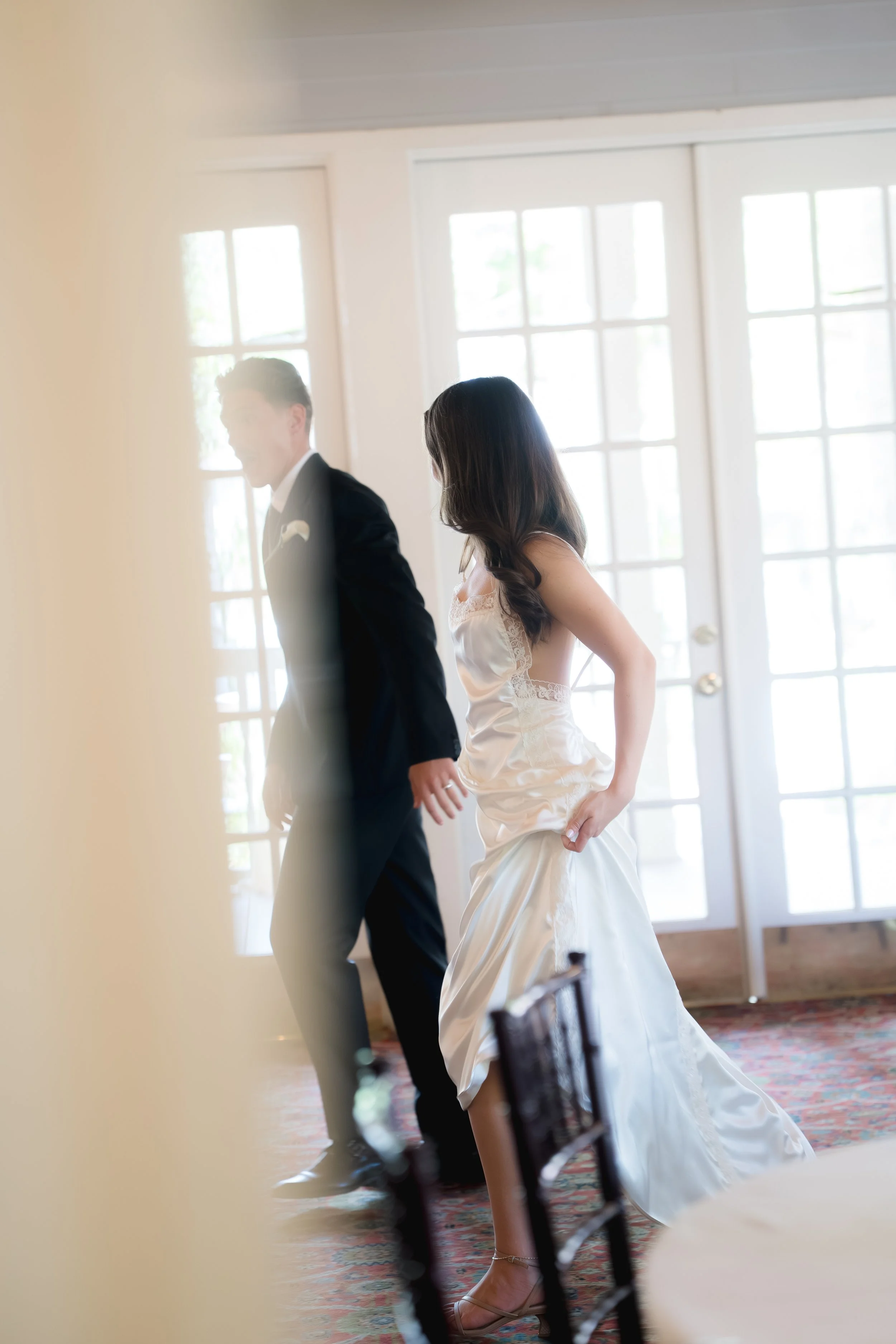 Candid wedding reception photos at Dr. Phillips House in Orlando, Florida captured by Florida Documentary Wedding Photographer Catherine Skelly