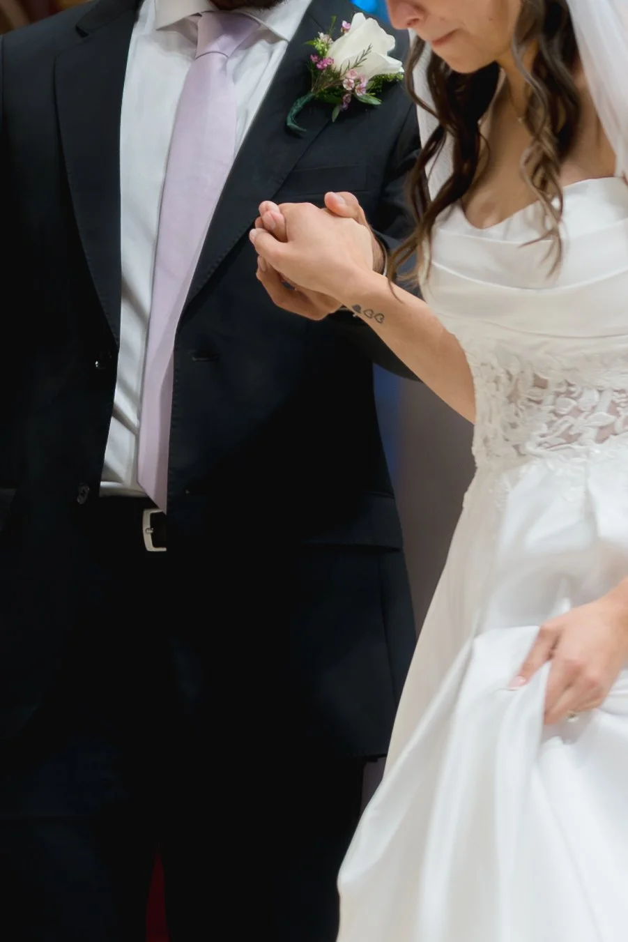 Catholic Wedding Ceremony at Co-Cathedral St. Thomas Moore in Tallahassee, Florida captured by Florida Documentary Photographer Catherine Skelly