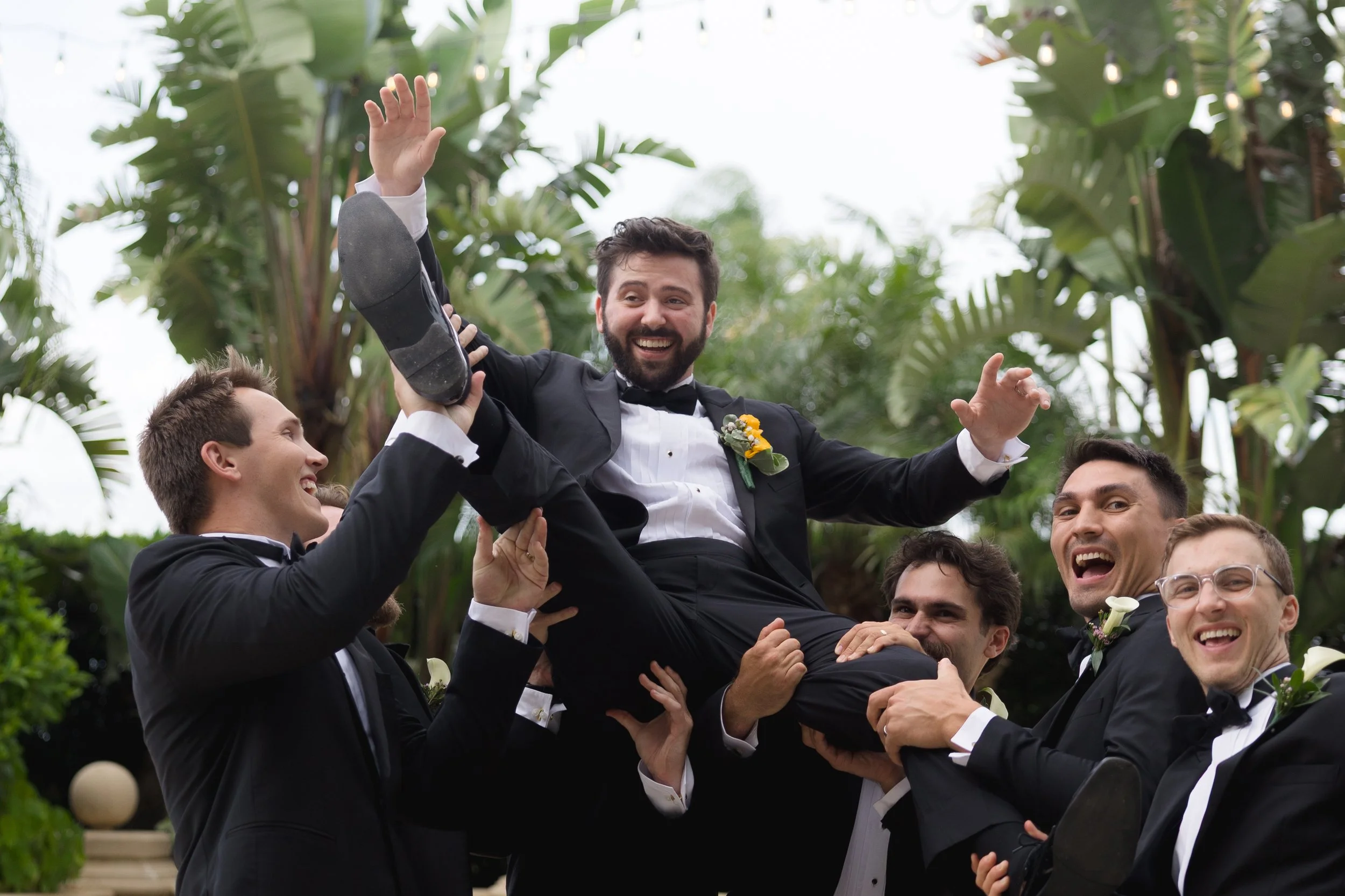 Fun Groomsmen Portraits captured at The Club at The Strand in Naples, Florida by Florida Documentary Wedding Photographer Catherine Skelly