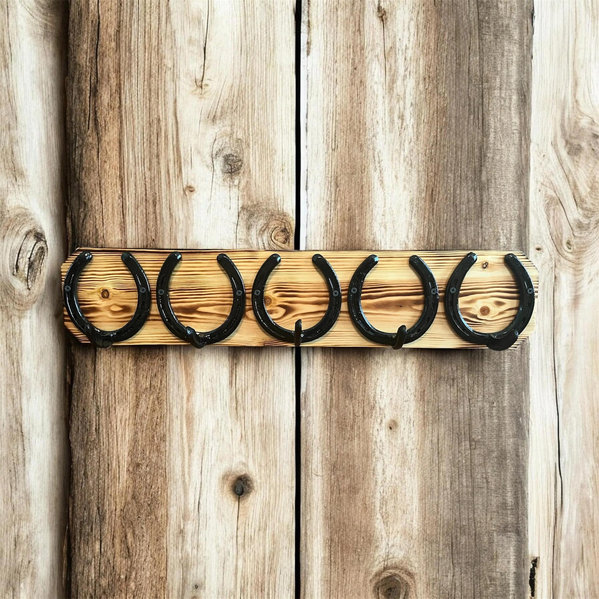 Rustic Horseshoe Coat Rack on Wood