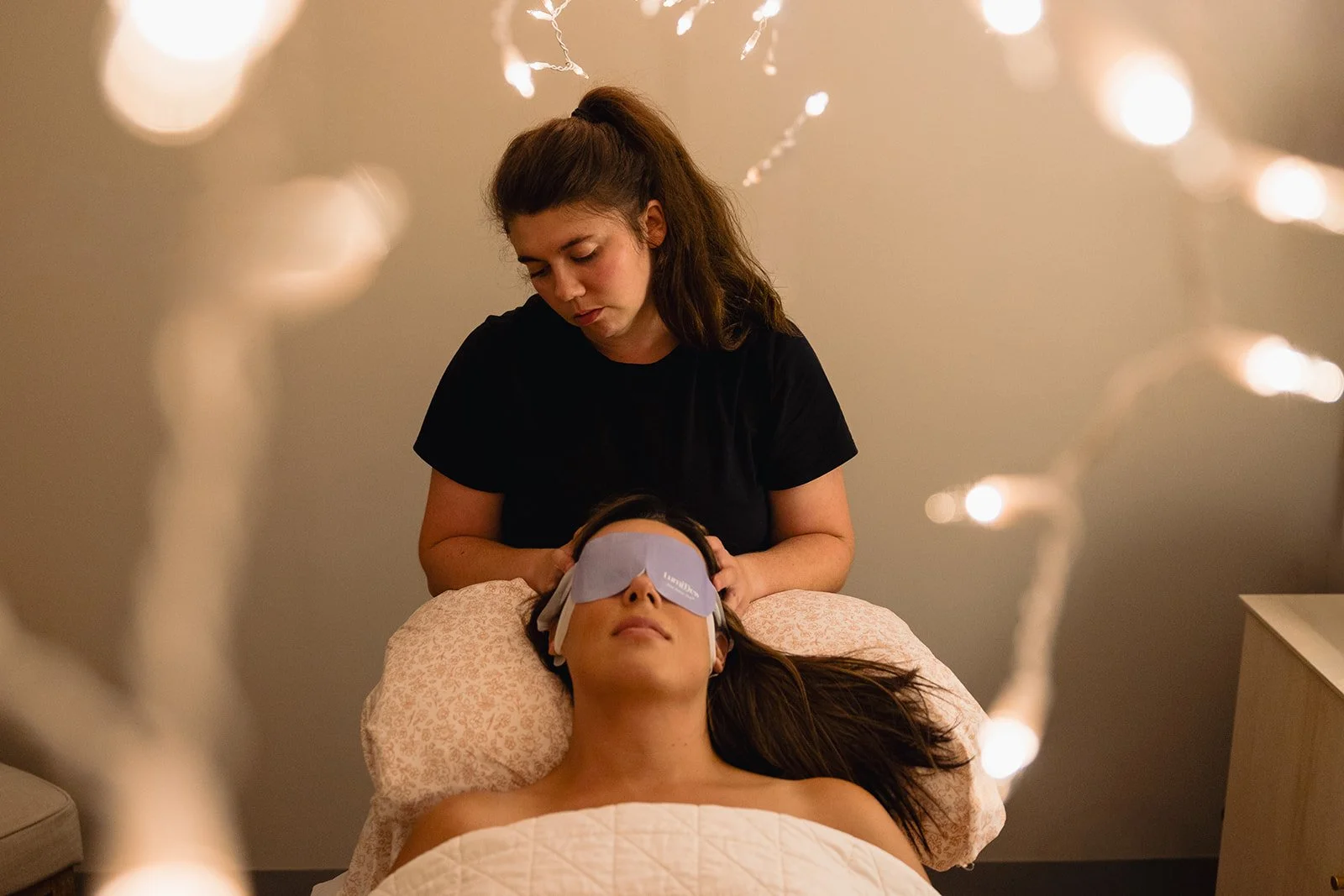 A mother receiving a prenatal massage.