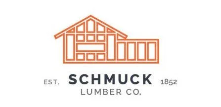 Logo for Schmuck Lumber Co., established in 1852, featuring a stylized house outline.