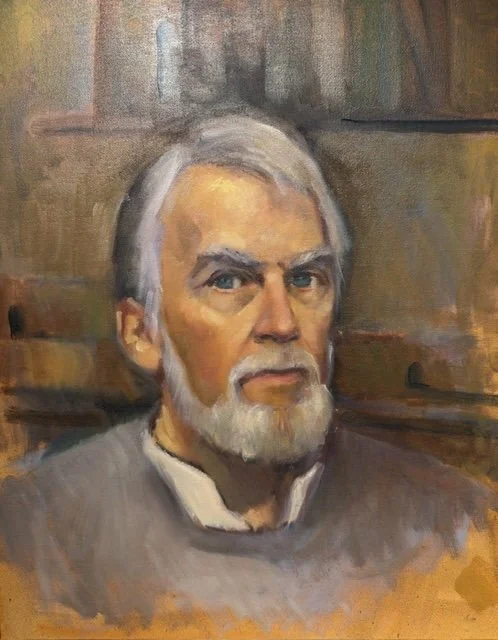 Self portrait of artist Gordon Johnson. He has blue eyes, gray hair and beard.