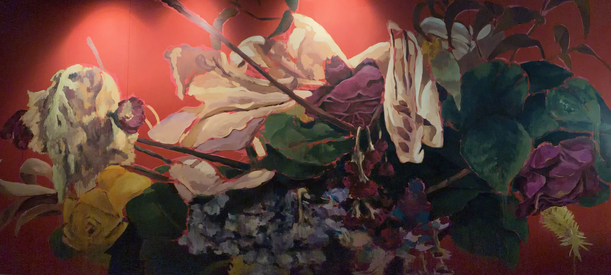 A painting of various flowers and leaves on a red background.