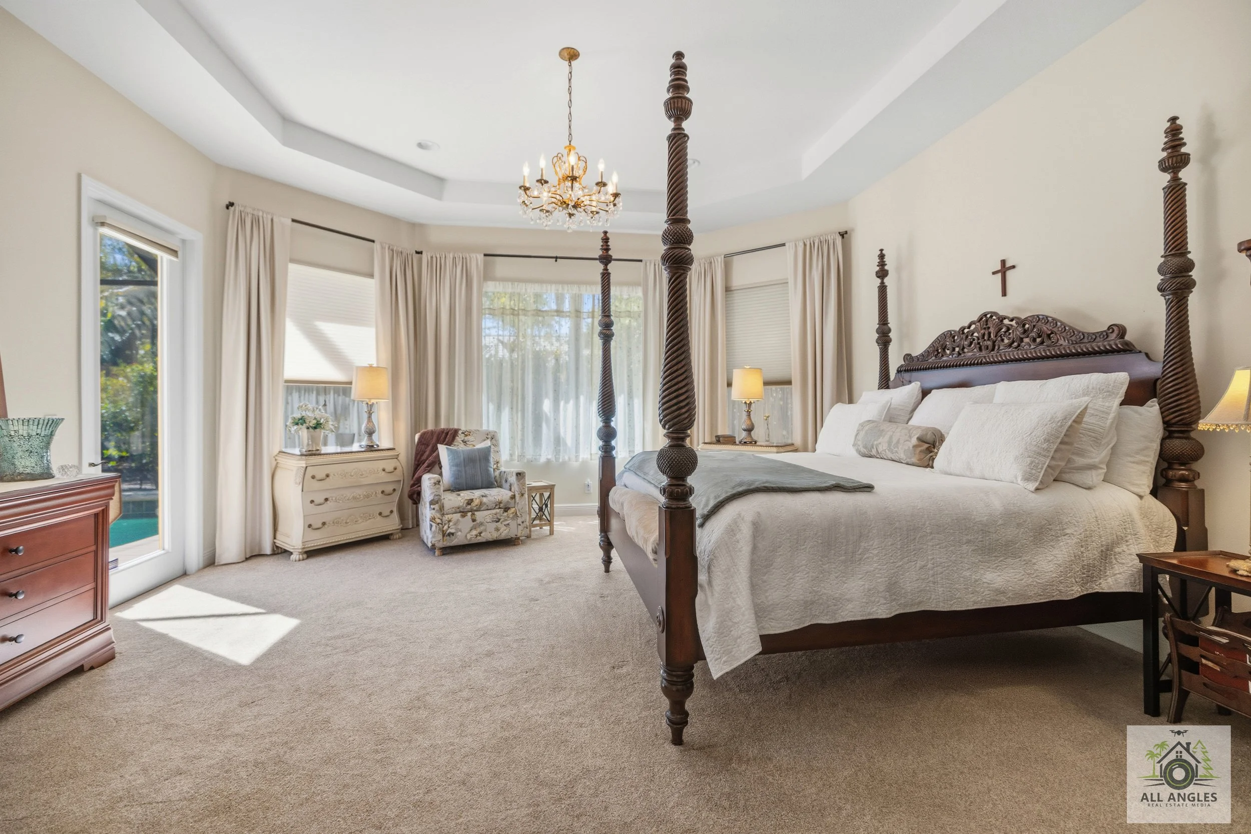 Occupied home staging master bedroom with updated accessories and furniture placement