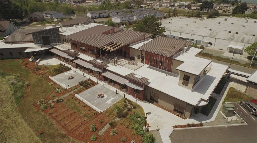 Commercial building metal roof replacement by McMurray and Sons Eureka California