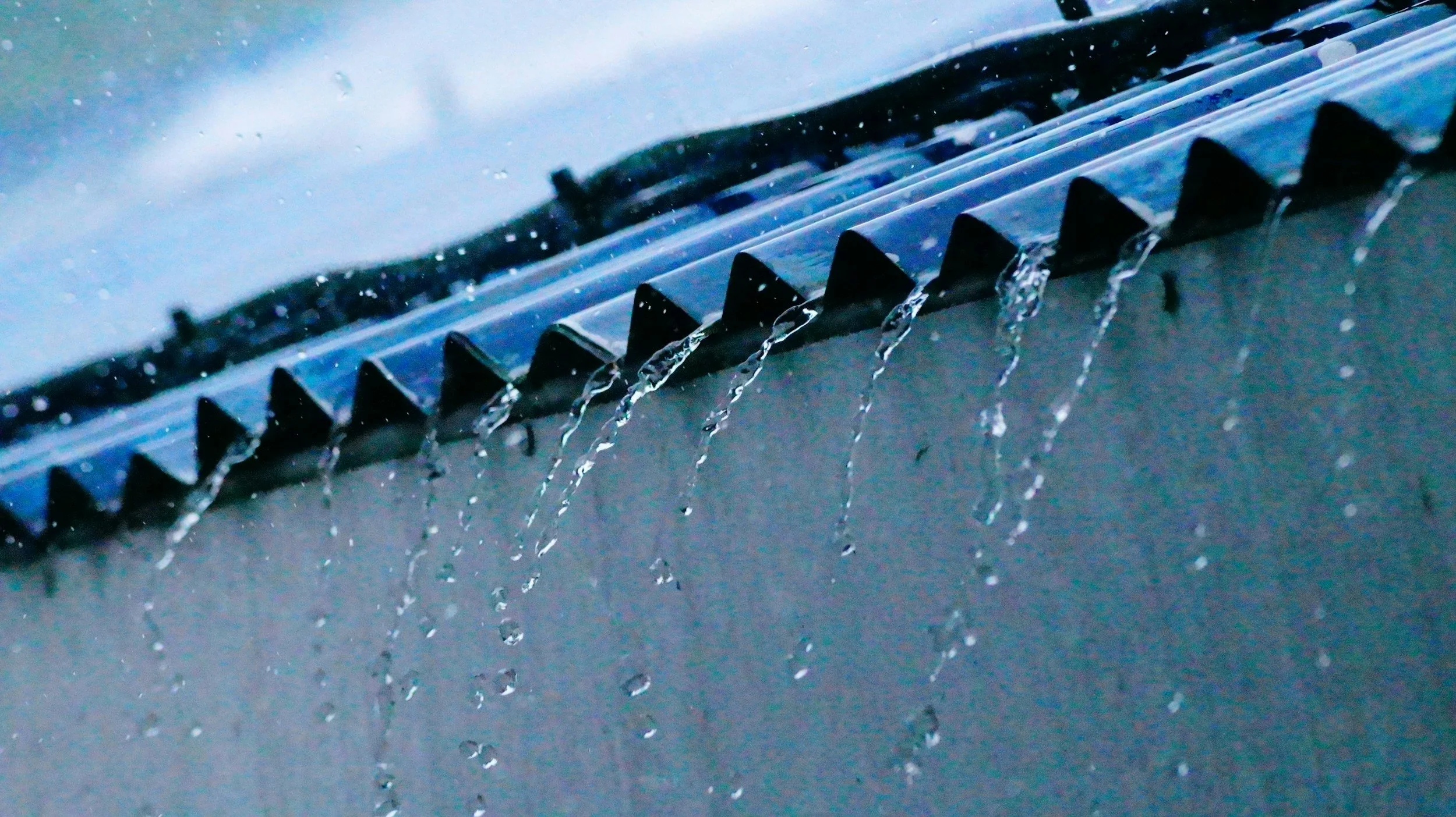 Heavy rain running off a roof during North Coast storm conditions