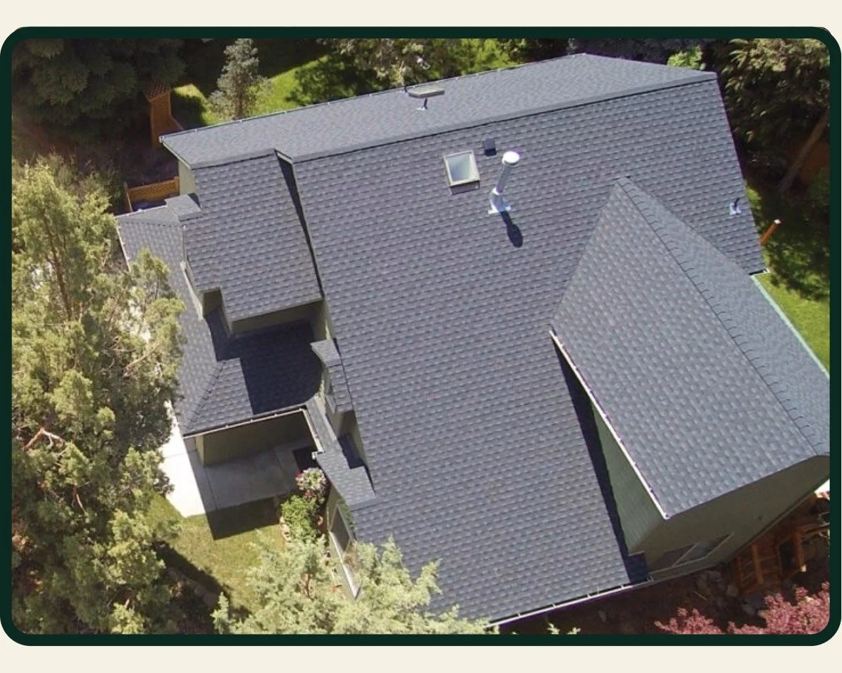 Newly installed asphalt shingle roof by Bend Oregon roofing company McMurray and Sons Roofing.