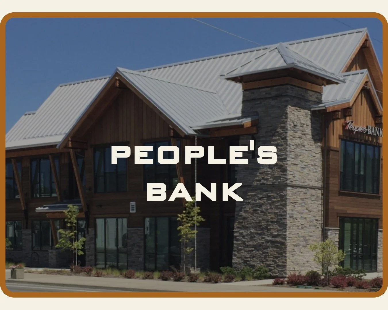 People's Bank in Grants Pass Oregon with a newly installed metal roofing by McMurray and Sons Bend crew