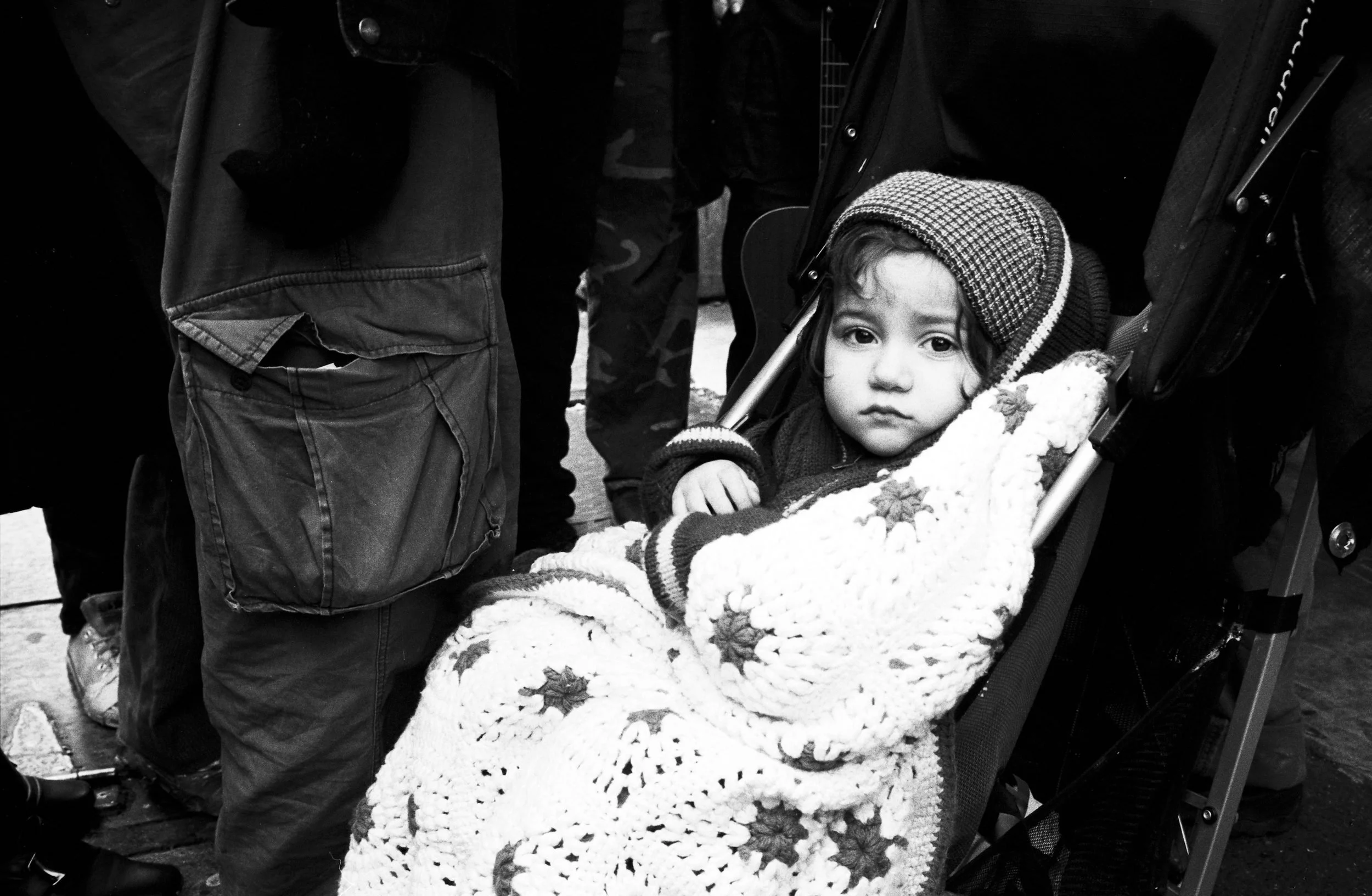 A young girl at an anti-gentrification protest in front of the Piccadilly Hotel in Vancouver. 2007.