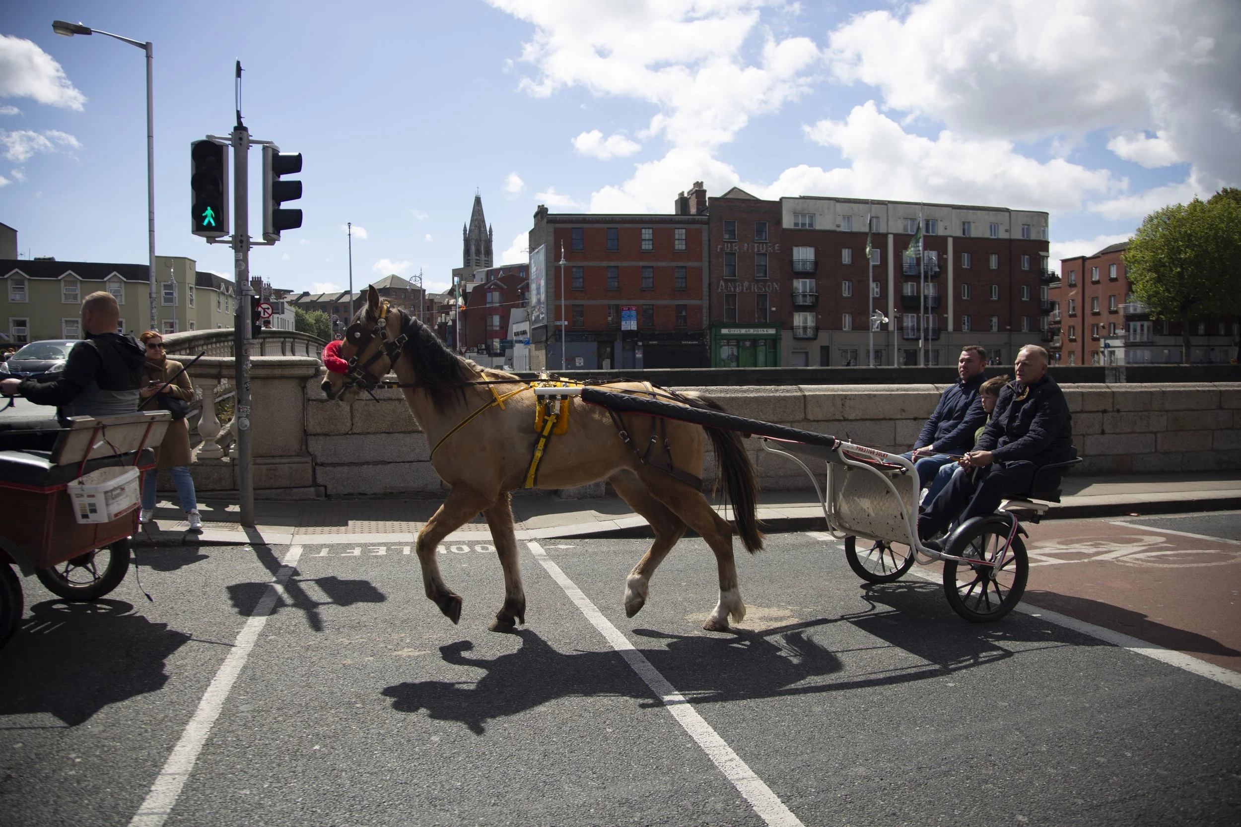 A horse-drawn carriage turns onto the streets of the city centre in Dublin, Ireland after the Smithfield Horse Fair on Sunday, May 10, 2026.
