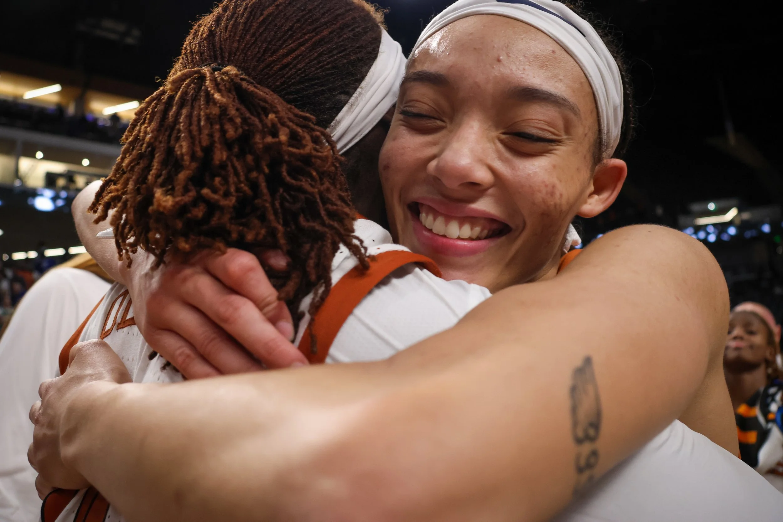 Guard Ndjakalenga Mwenentanda embraces center Kayla Oldacre after the Longhorns defeat the TCU Horned Frogs in the Elite Eight game with a final score of 58-47 in Birmingham, Alabama on Mar. 31, 2025. The Longhorns made their Final Four appearance fo