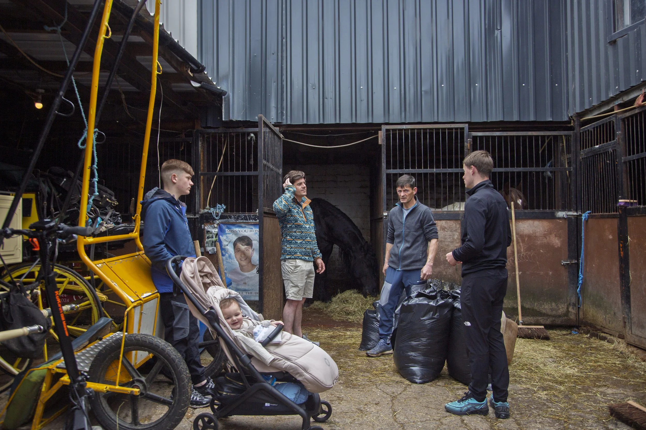 Four generations of O'Dwyers discuss the week's events at the family stables in Spitalfields, Dublin, Ireland on Monday, May 18, 2026.