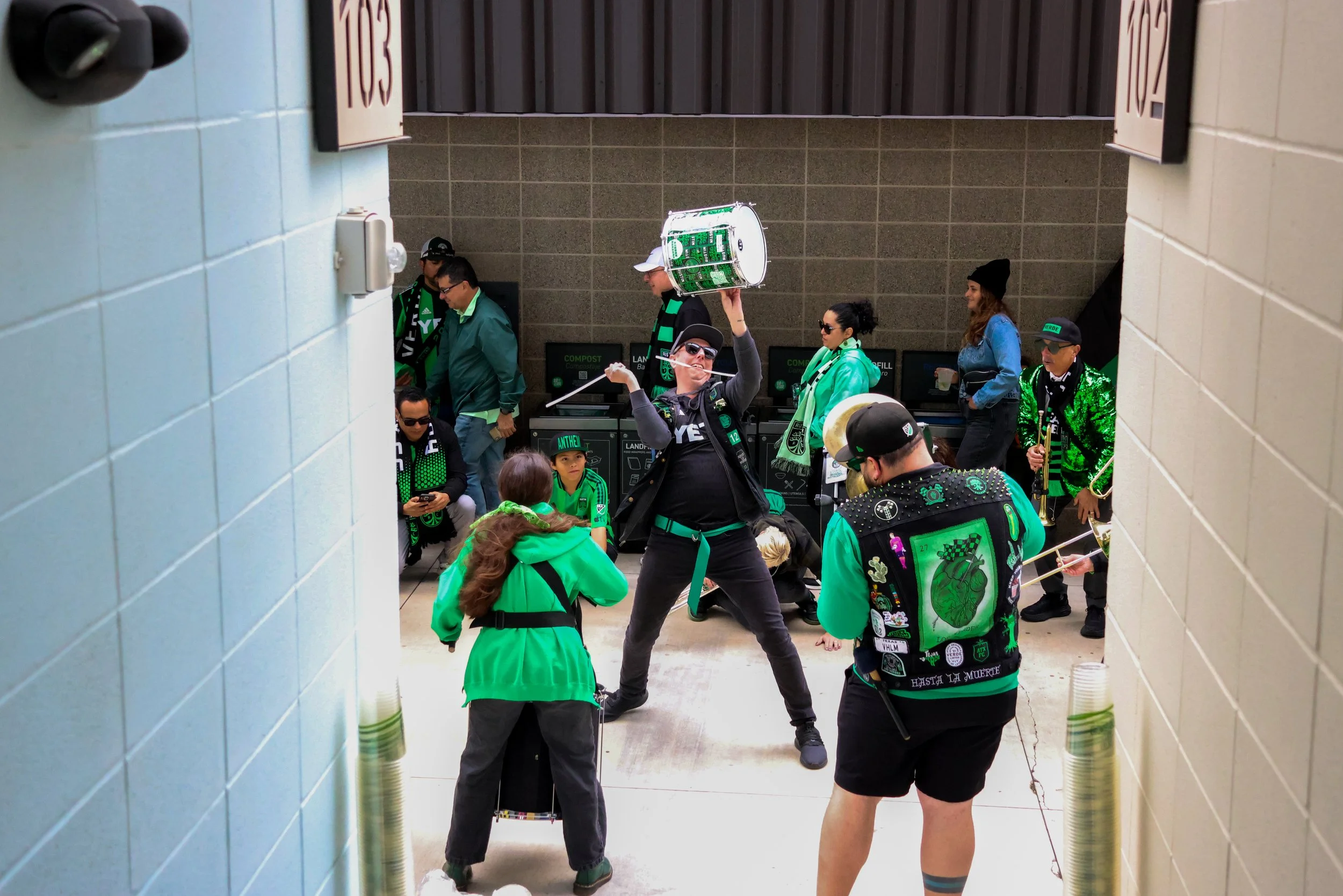 Los Verdes, the unofficial Austin FC pep squad, plays their instruments around Q2 Stadium ahead of a match against the Portland Timbers on April 5, 2025. The match ended scoreless.