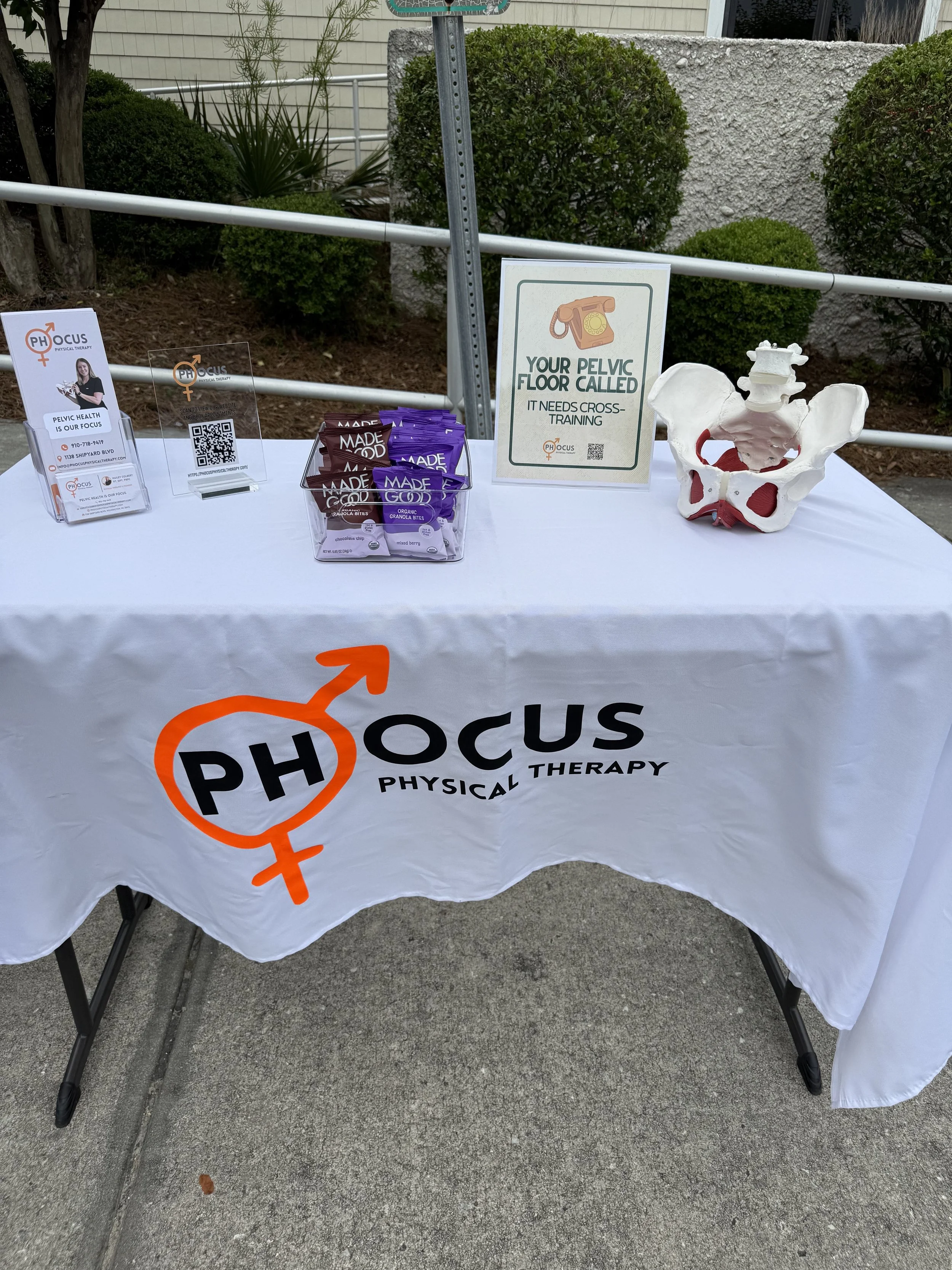 Hailey Colbert, pelvic floor physical therapist and owner of Phocus Physical Therapy, participating in a community event with The Momilates Group in Wilmington, NC.