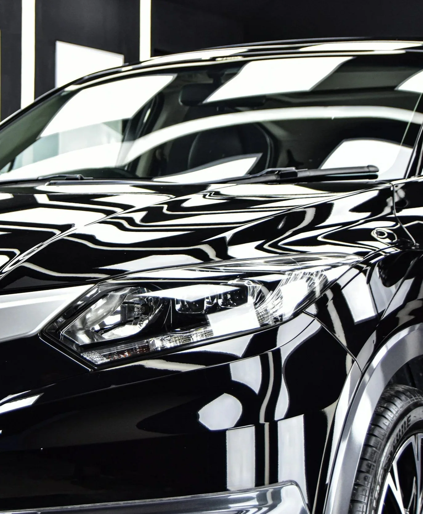 a very glossy car view front the front