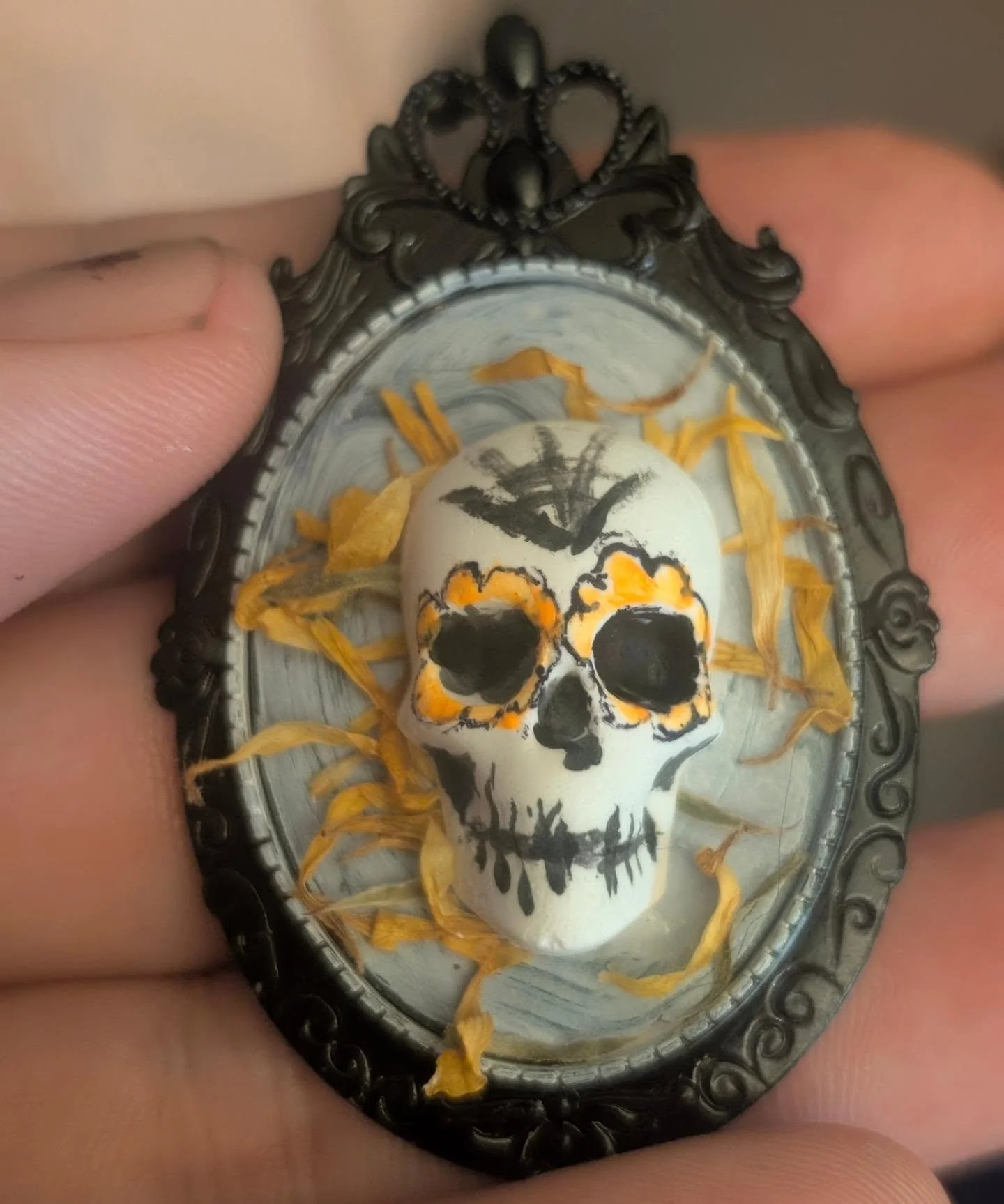 Prototyping some cute sugar skull pins.