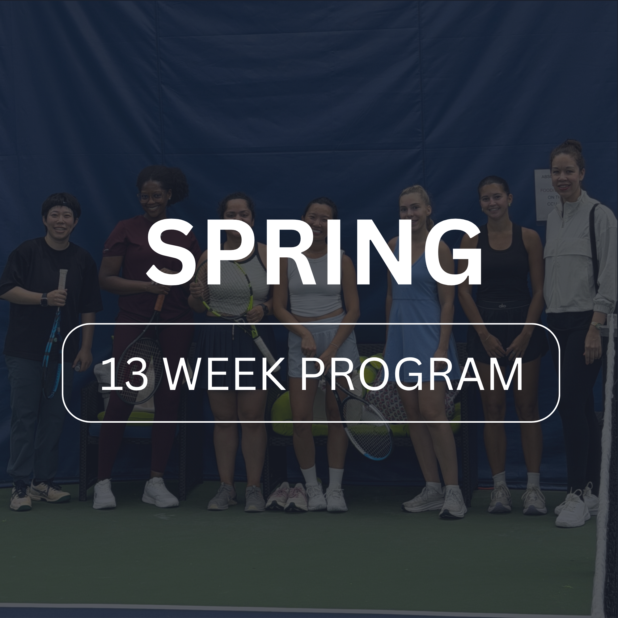 Group of diverse women and men standing together on a tennis court, smiling, with tennis rackets, in athletic clothing, during daytime.