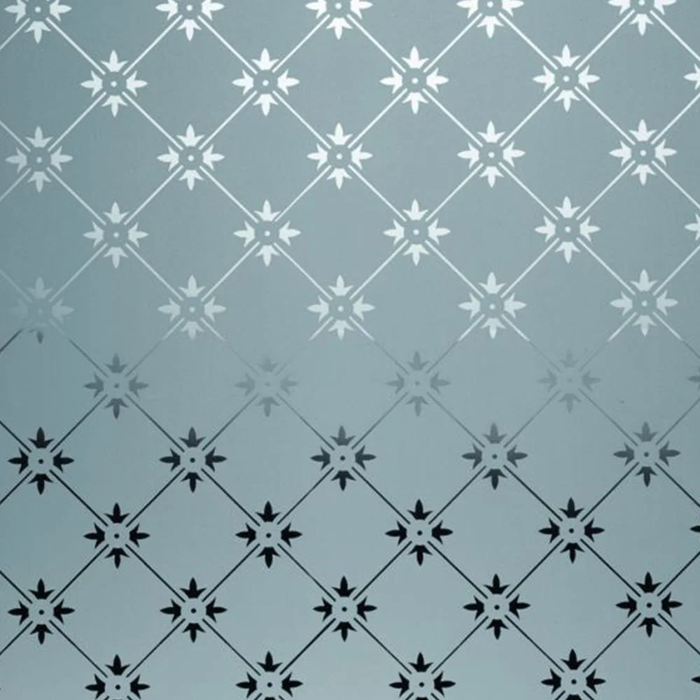 Pattern of white and black star-shaped snowflakes connected by lines on a light blue background.