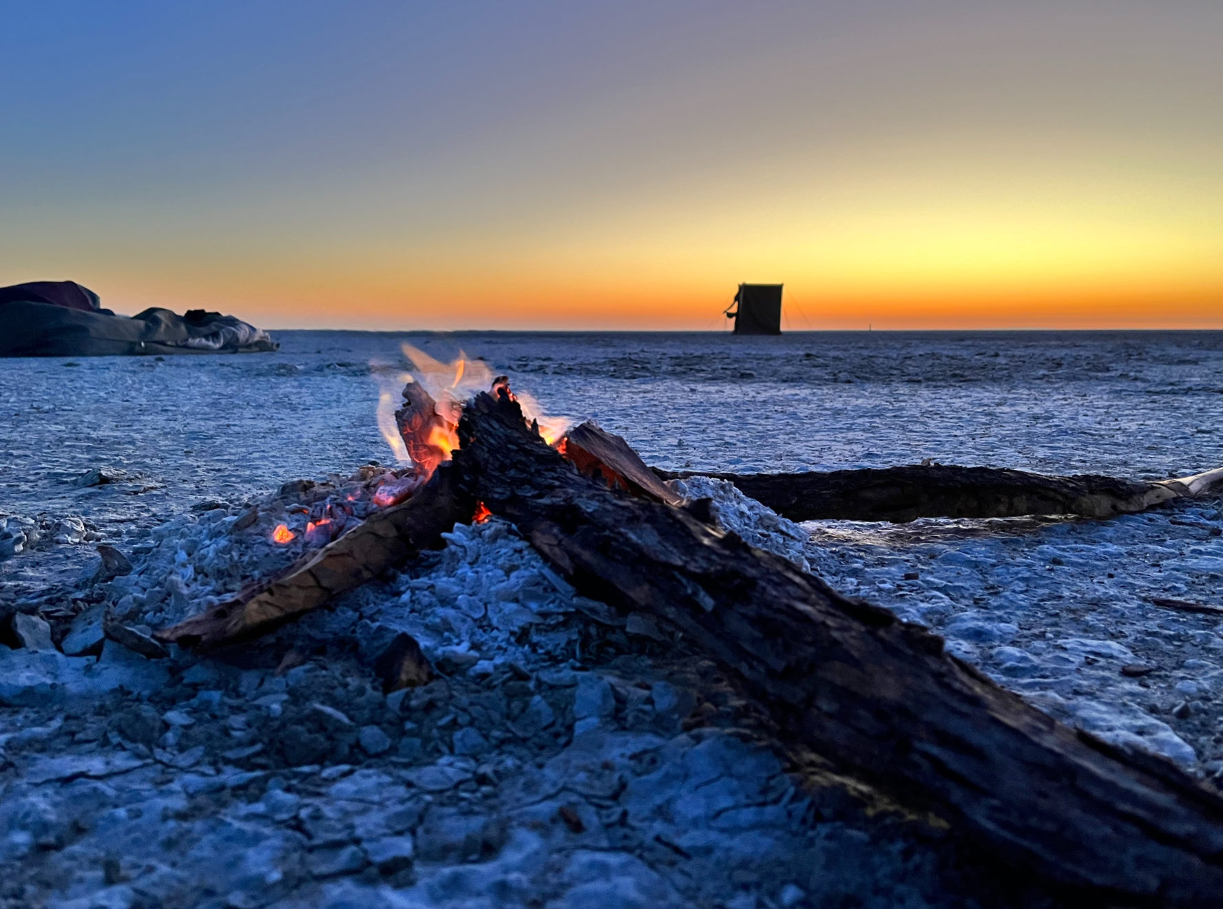 Close up of a fire early in the morning on the Makgadikgadi Salt Pans, Botswana.