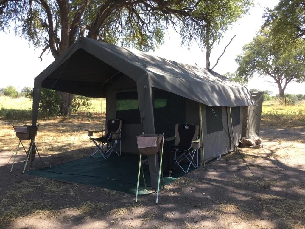 Safari tent on location of a mobile safari camp in the Okavango Delta, Botswana.