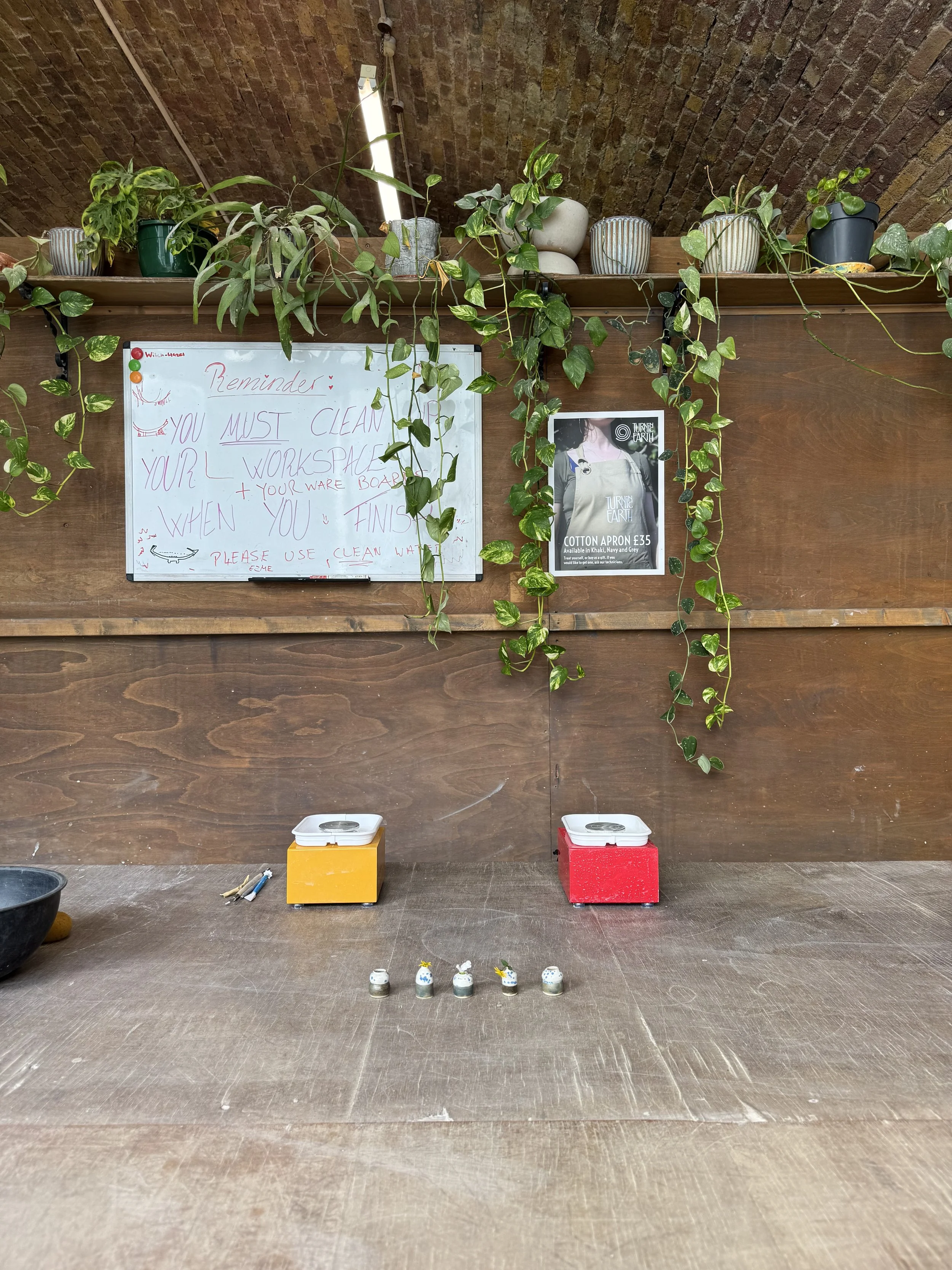 Throwing mini pots on the wheel