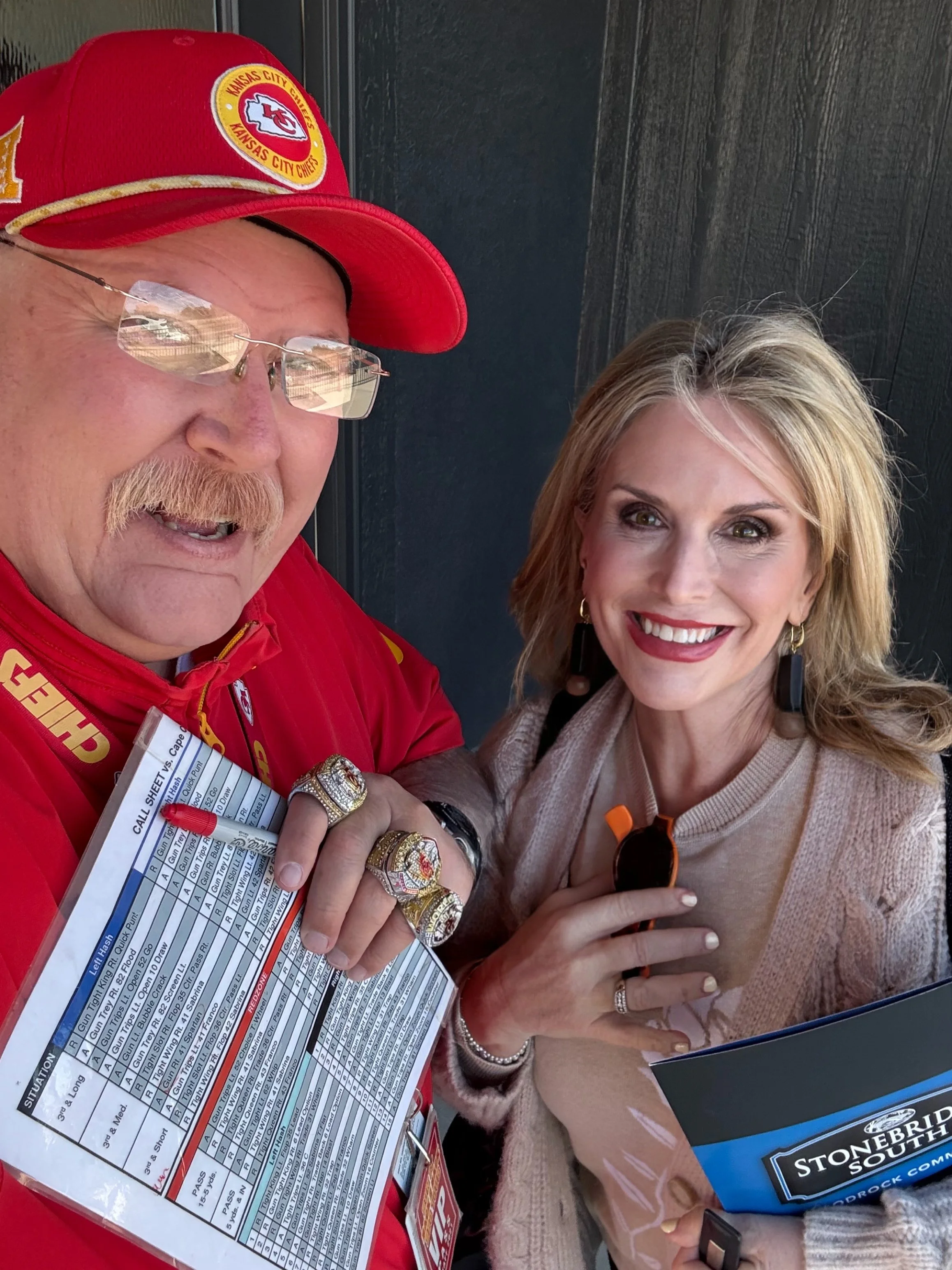 Vicki Ferguson with a Kansas City Chiefs fan at a local event.